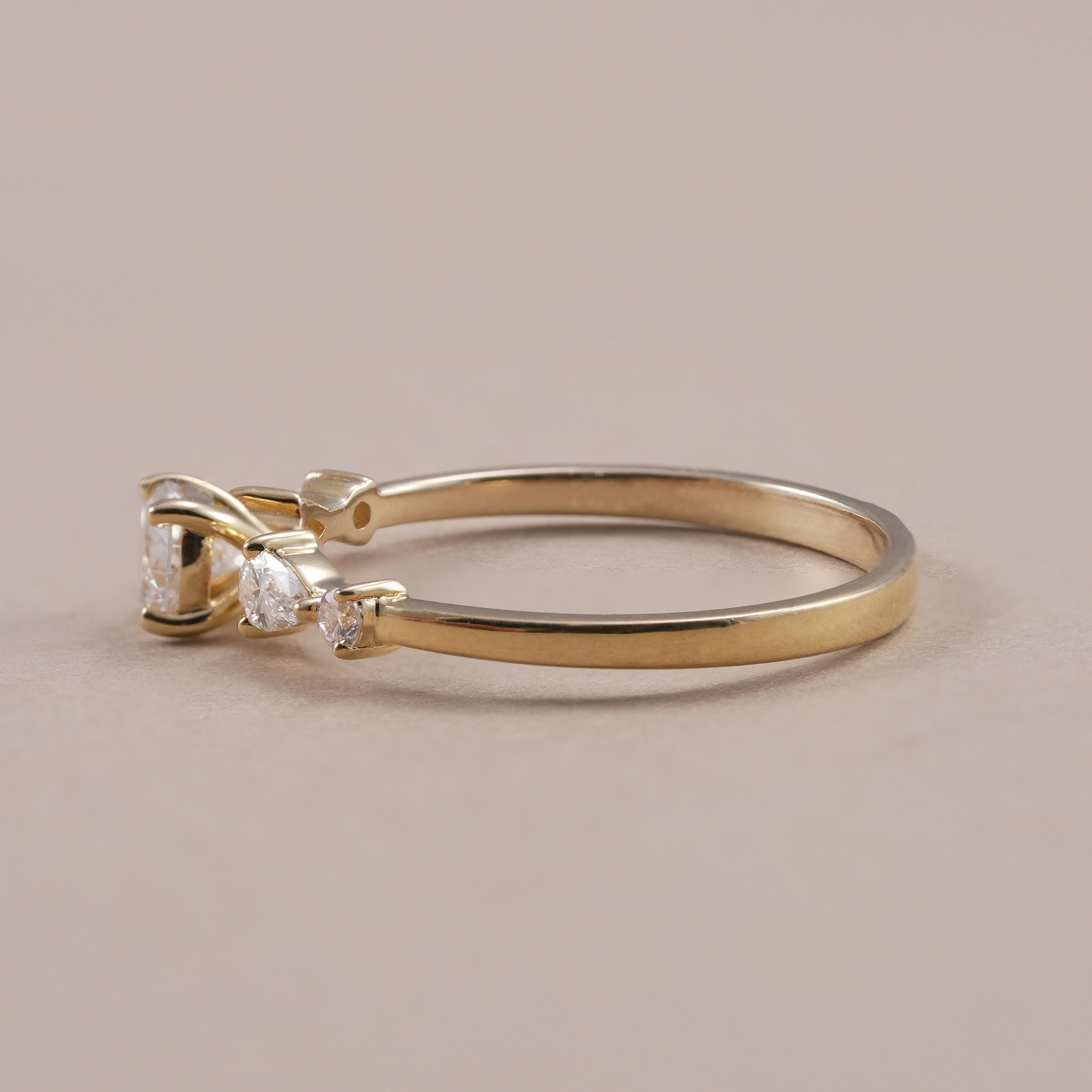 Minimalist yellow gold five stone diamond engagement ring