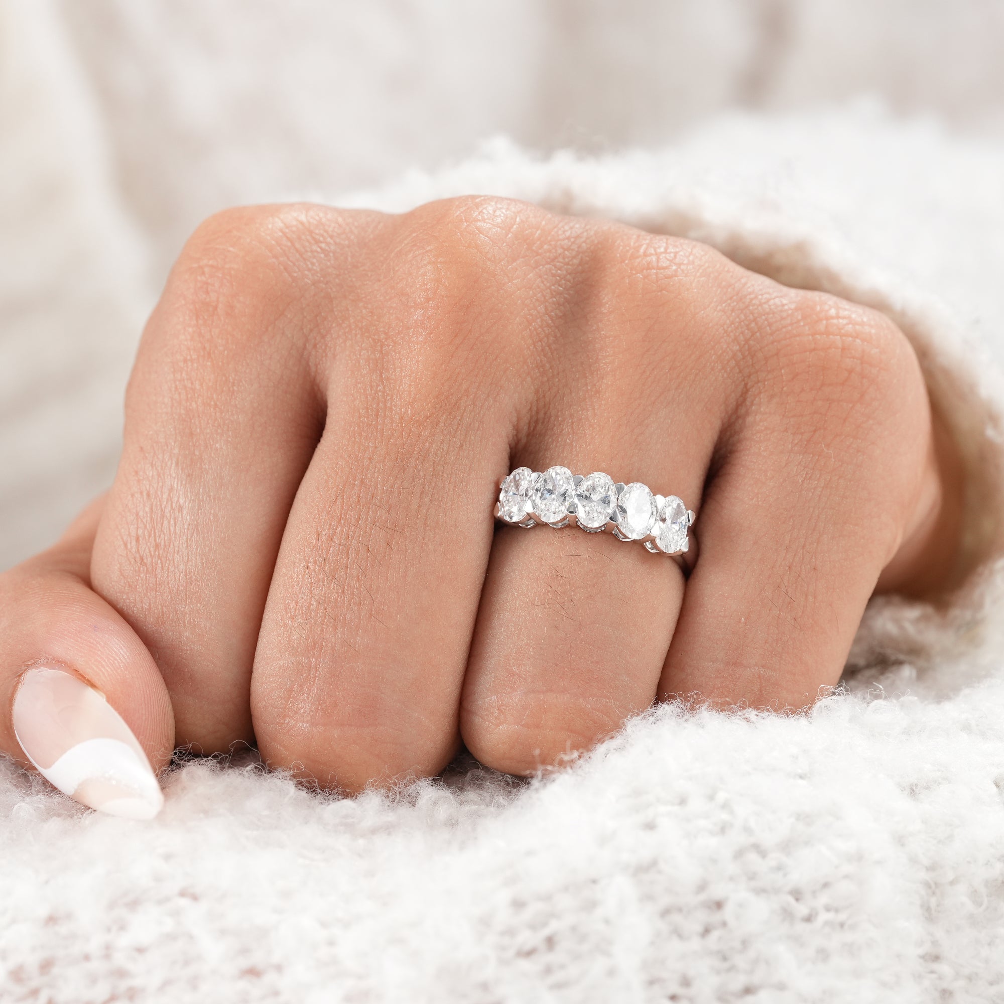 Fine jewelry oval diamond stackable anniversary band.