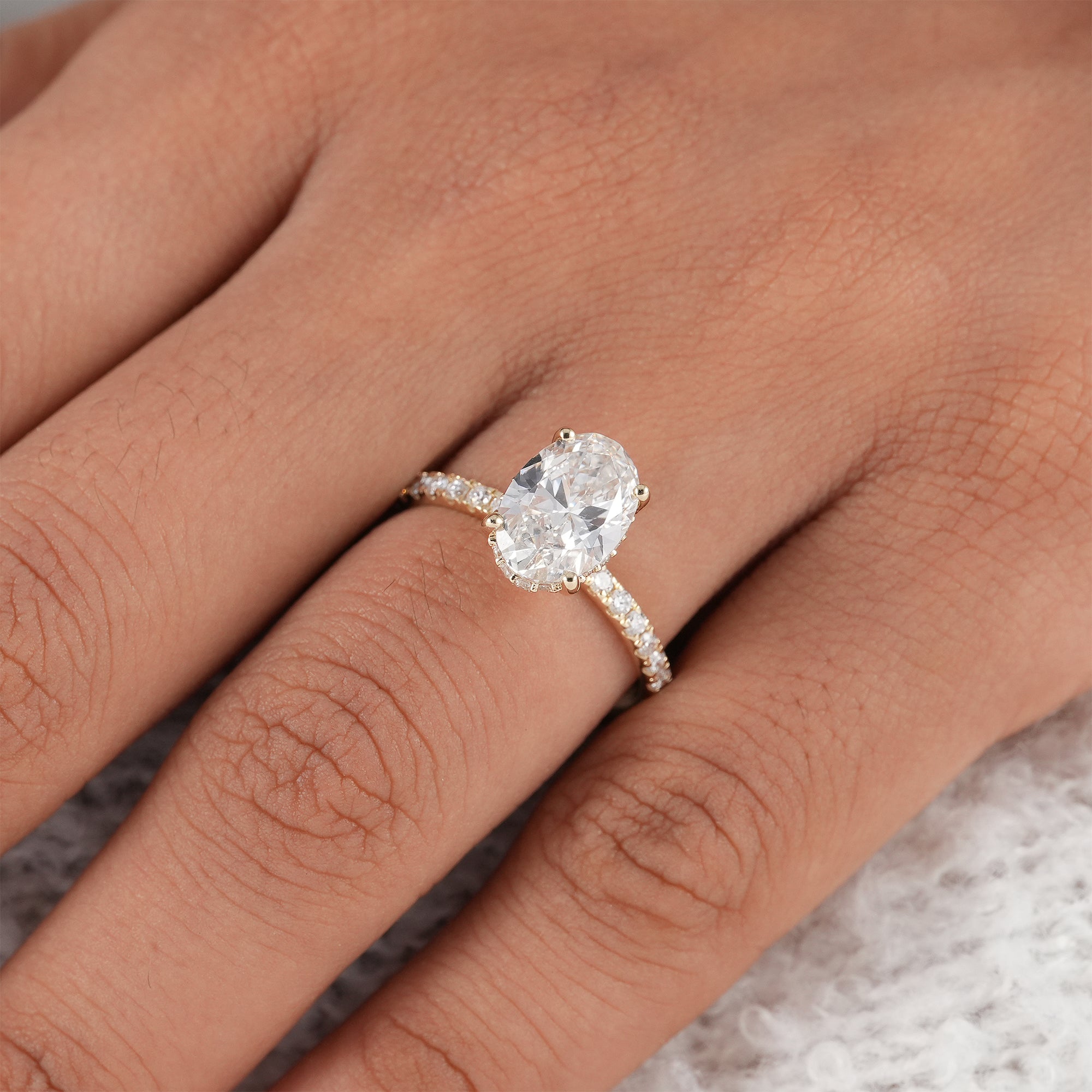Sustainable oval lab grown diamond engagement ring.