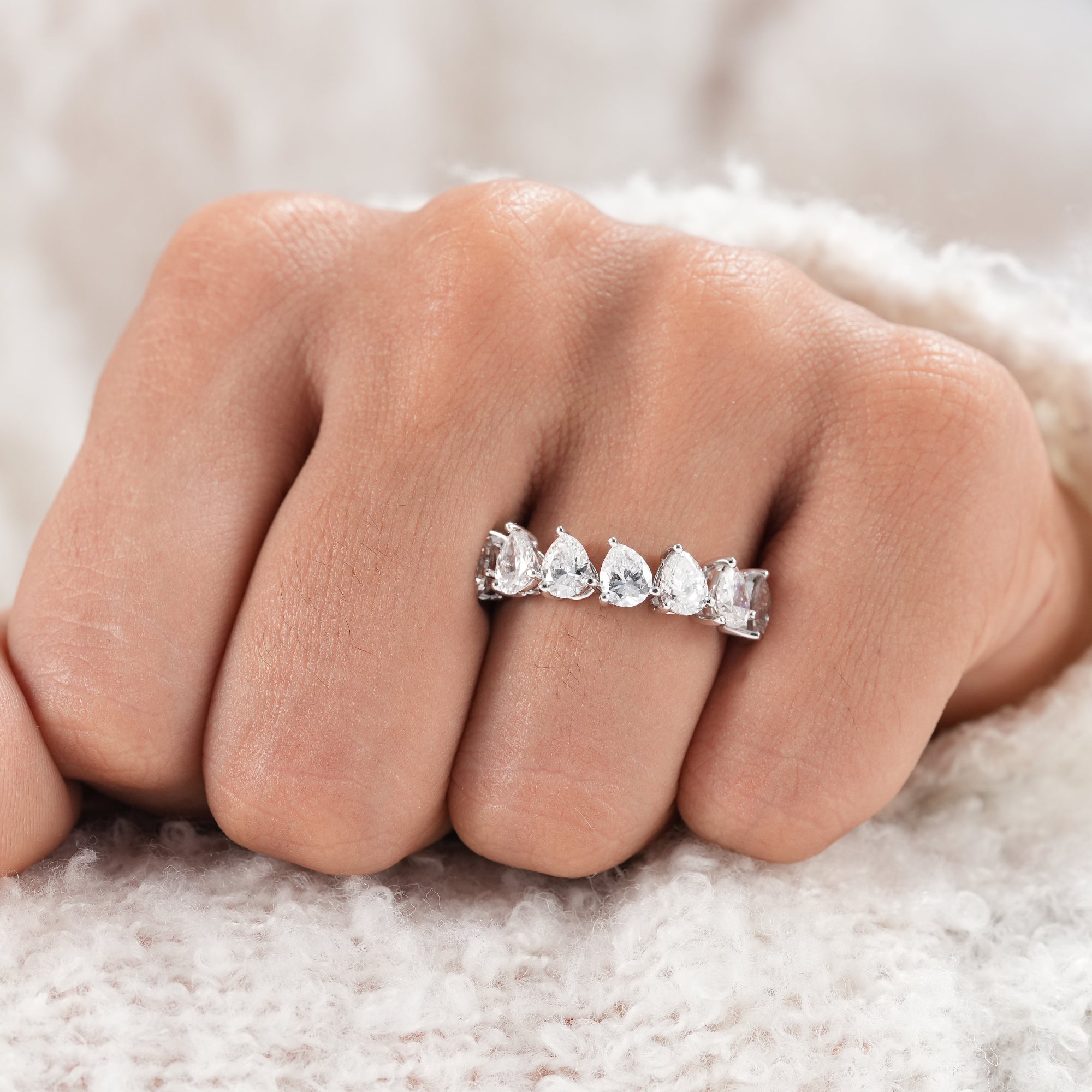Fine jewelry pear diamond stackable ring.