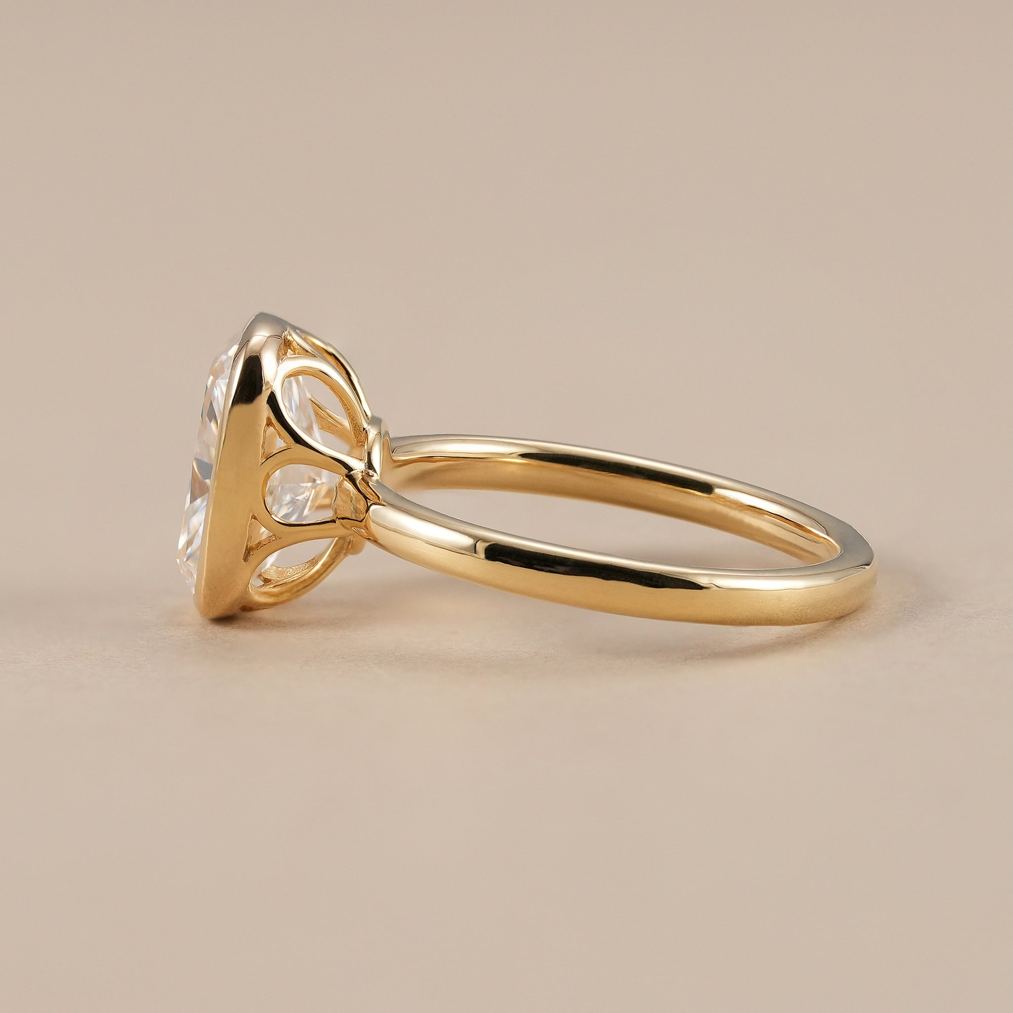 Radiant solitaire ring with elegant tulip setting