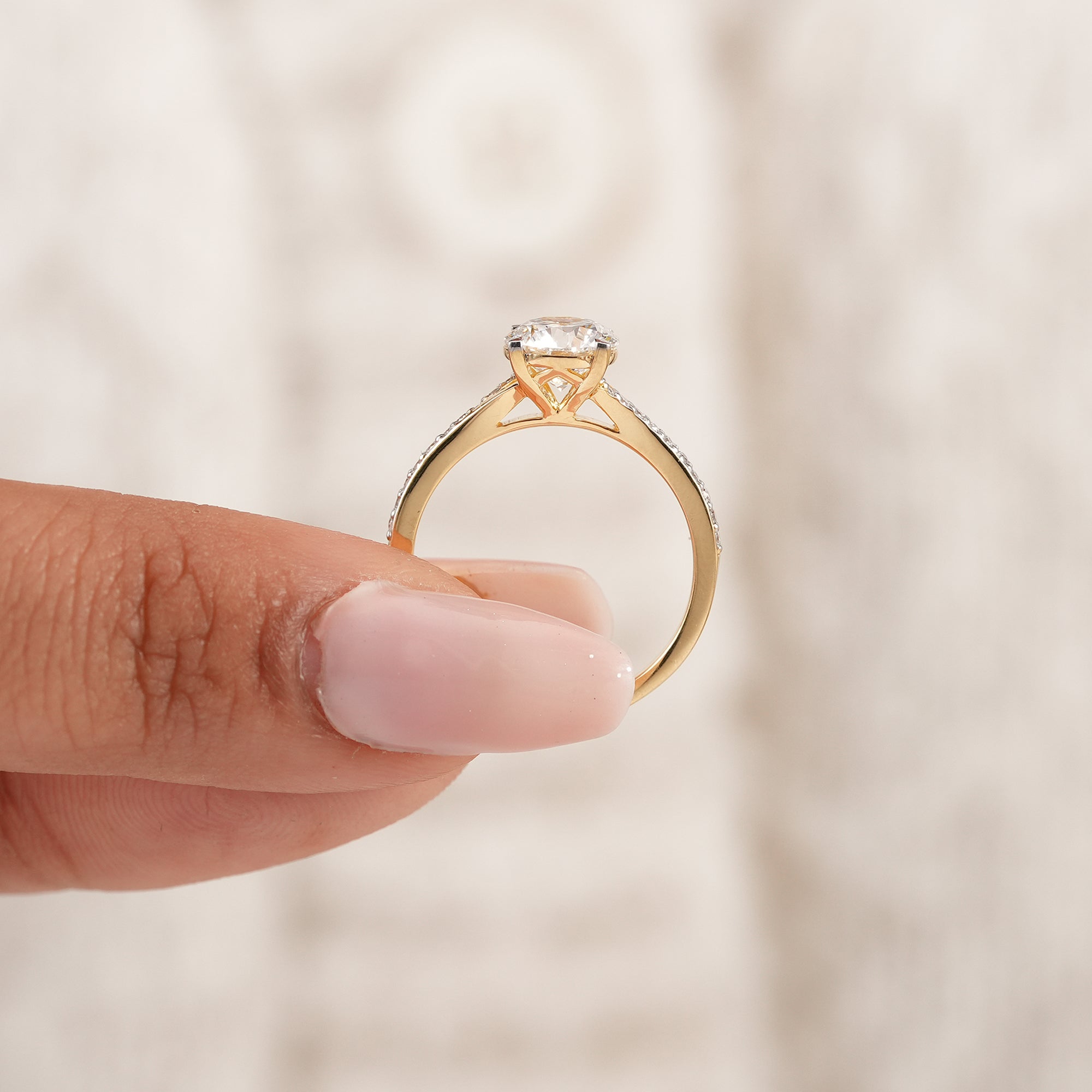 Fine jewelry round engagement ring with brilliant center diamond