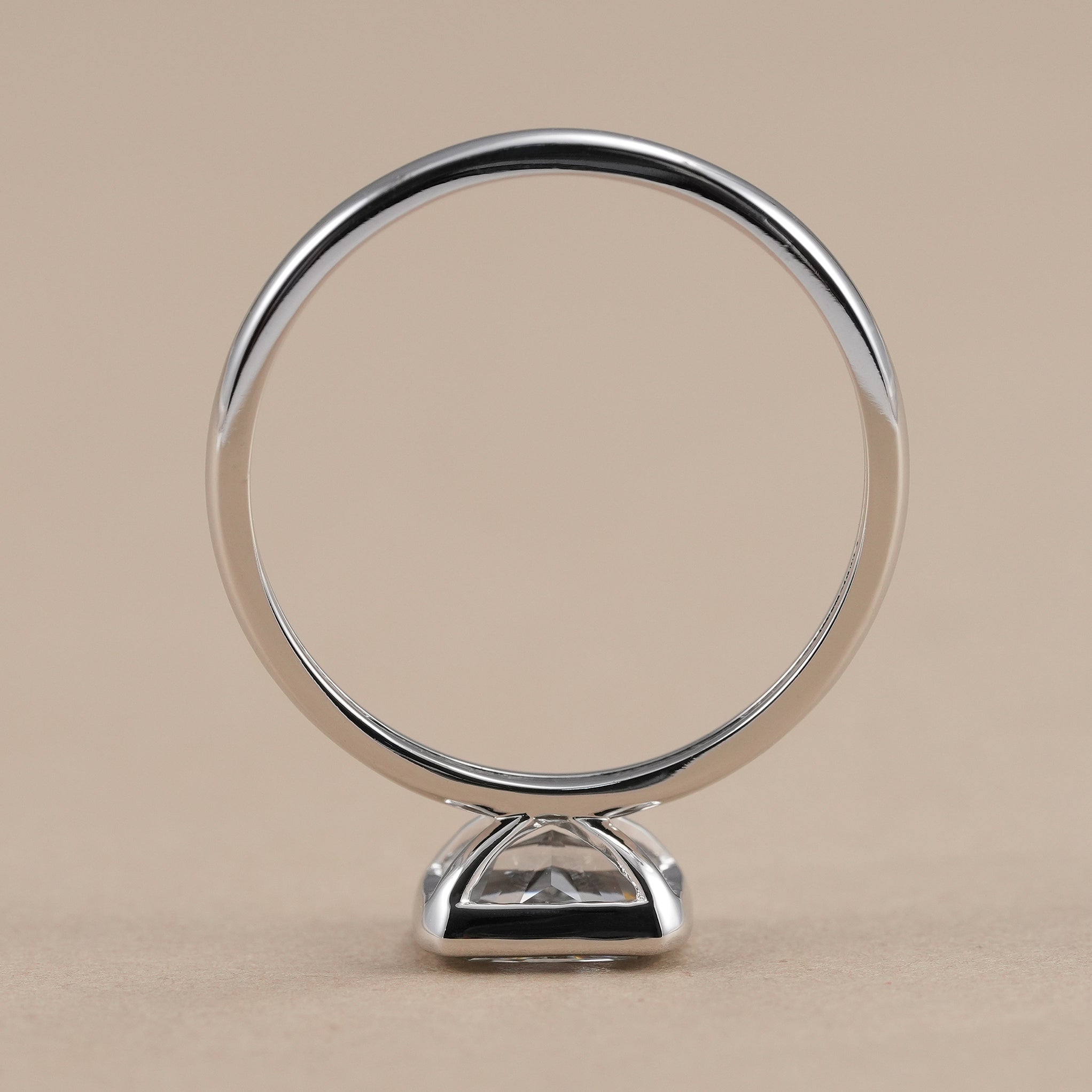 Sustainable bezel set radiant diamond ring handcrafted in gold
