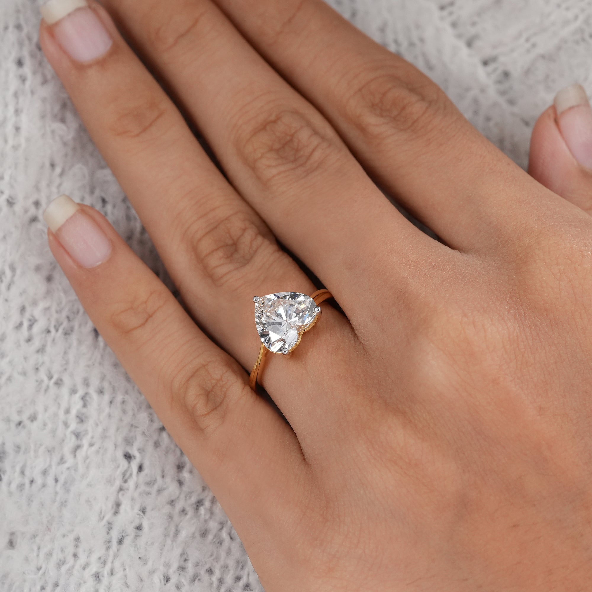 Heart diamond solitaire ring handcrafted in fine jewelry design.