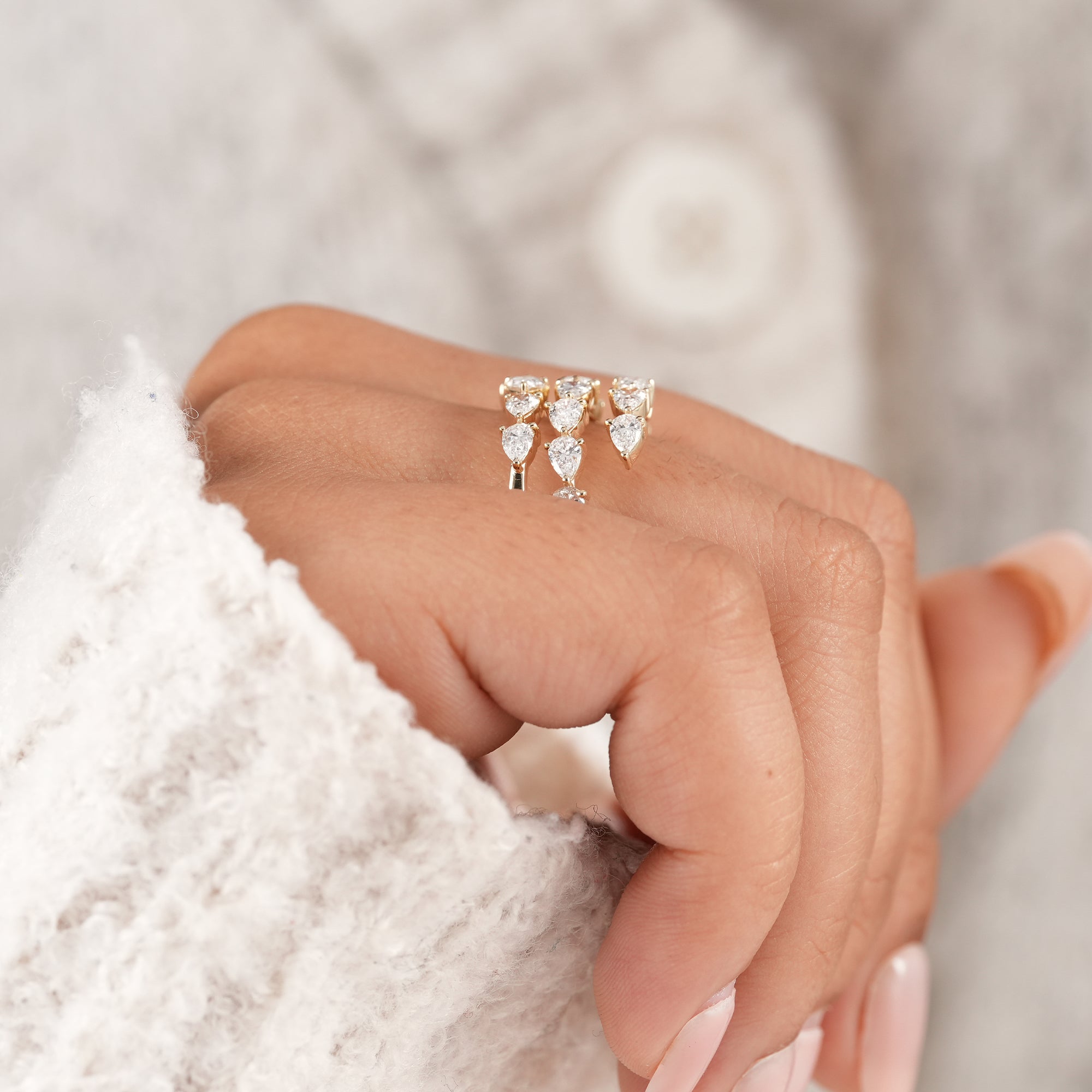 Premium pear diamond open band ring.