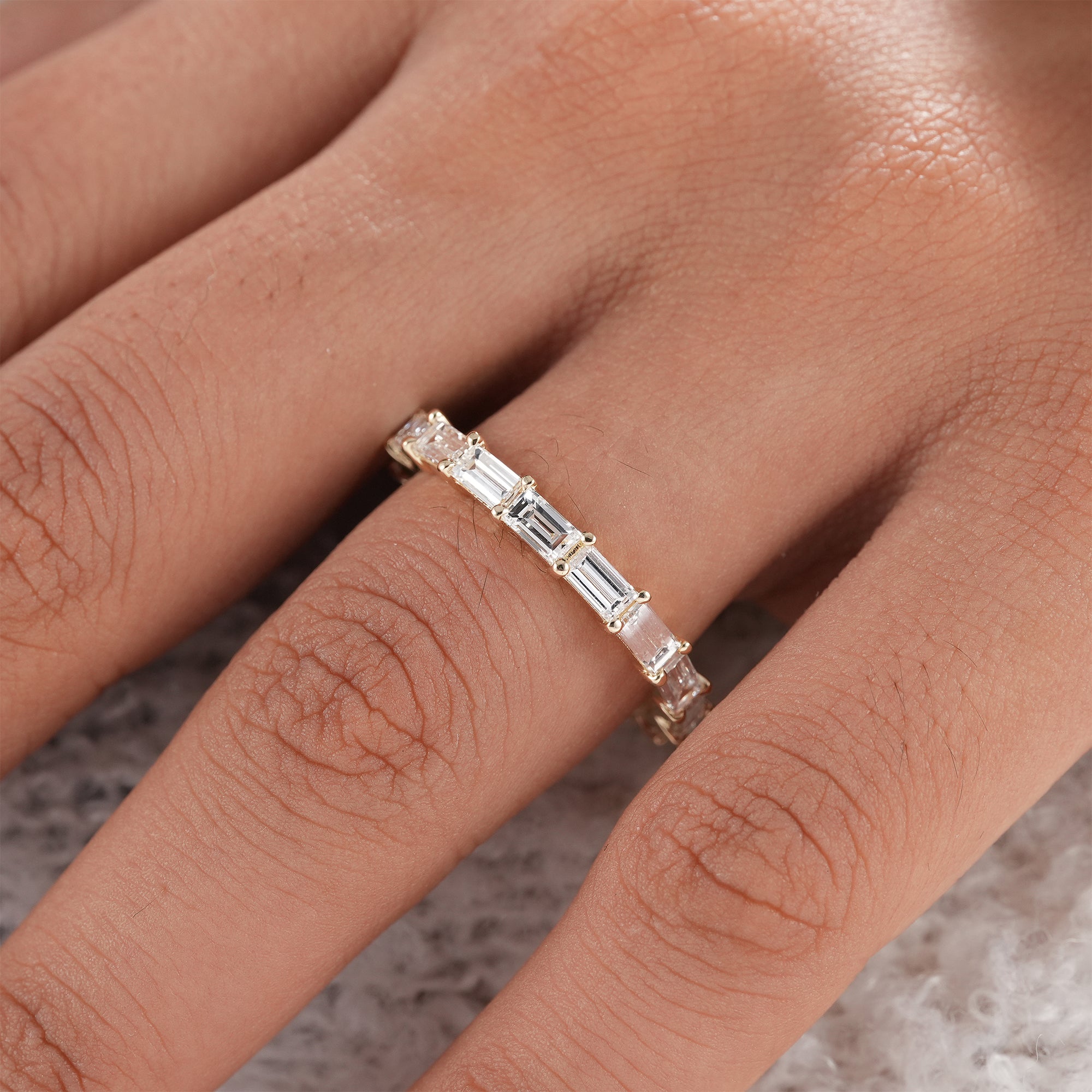 Sustainable lab grown baguette wedding band.