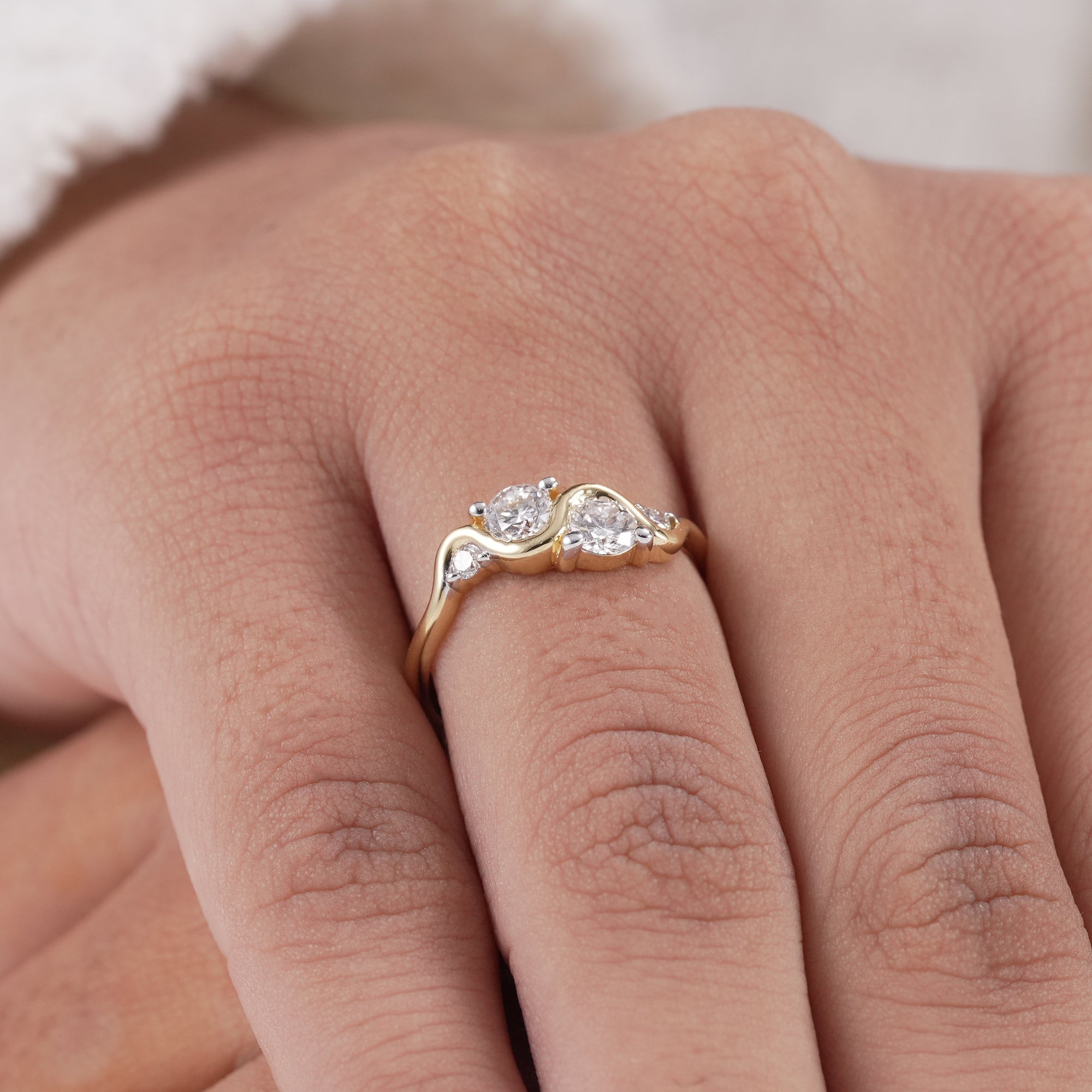 Stackable lab grown diamond ring with modern wave profile.