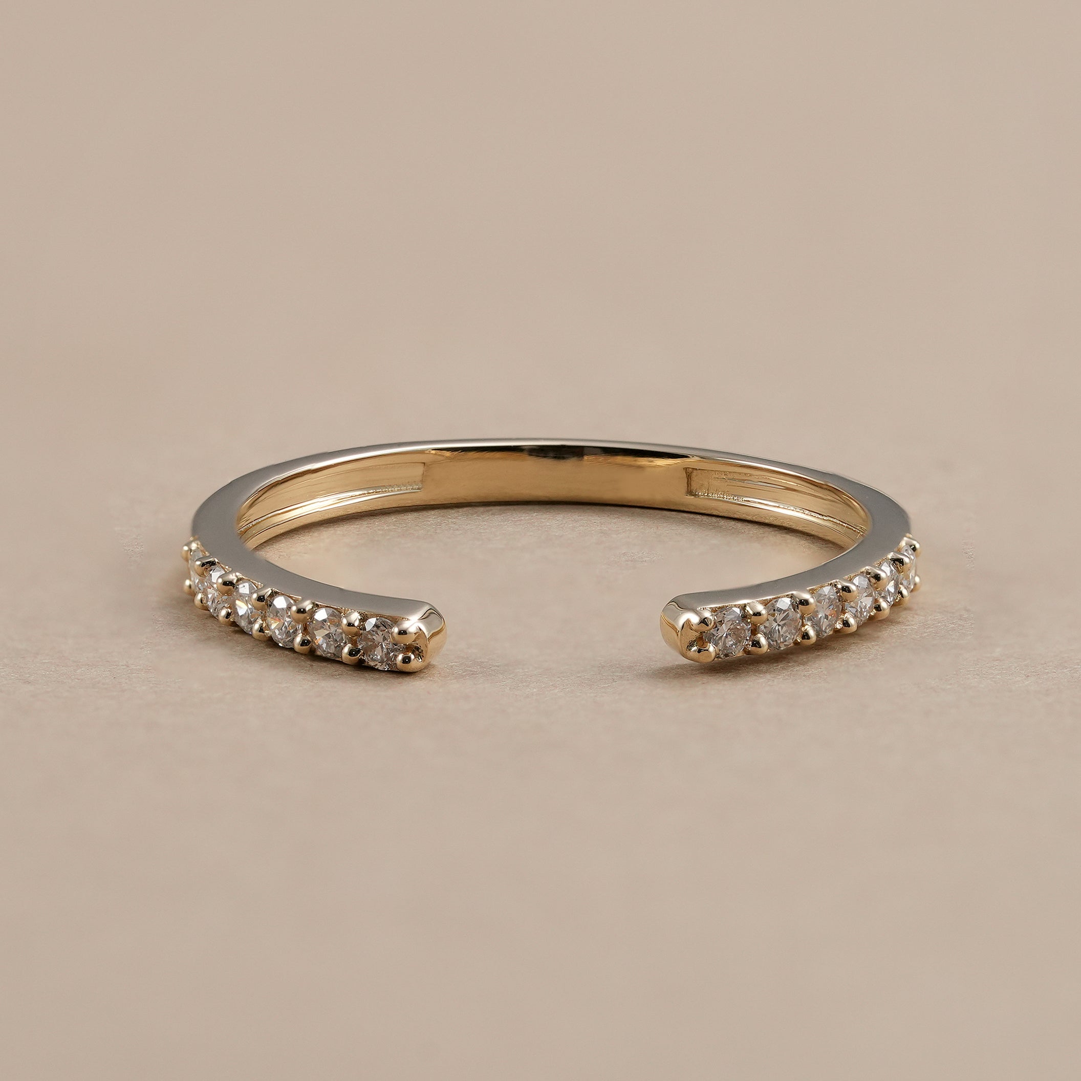 Open wedding band with round lab diamonds in a minimalist design