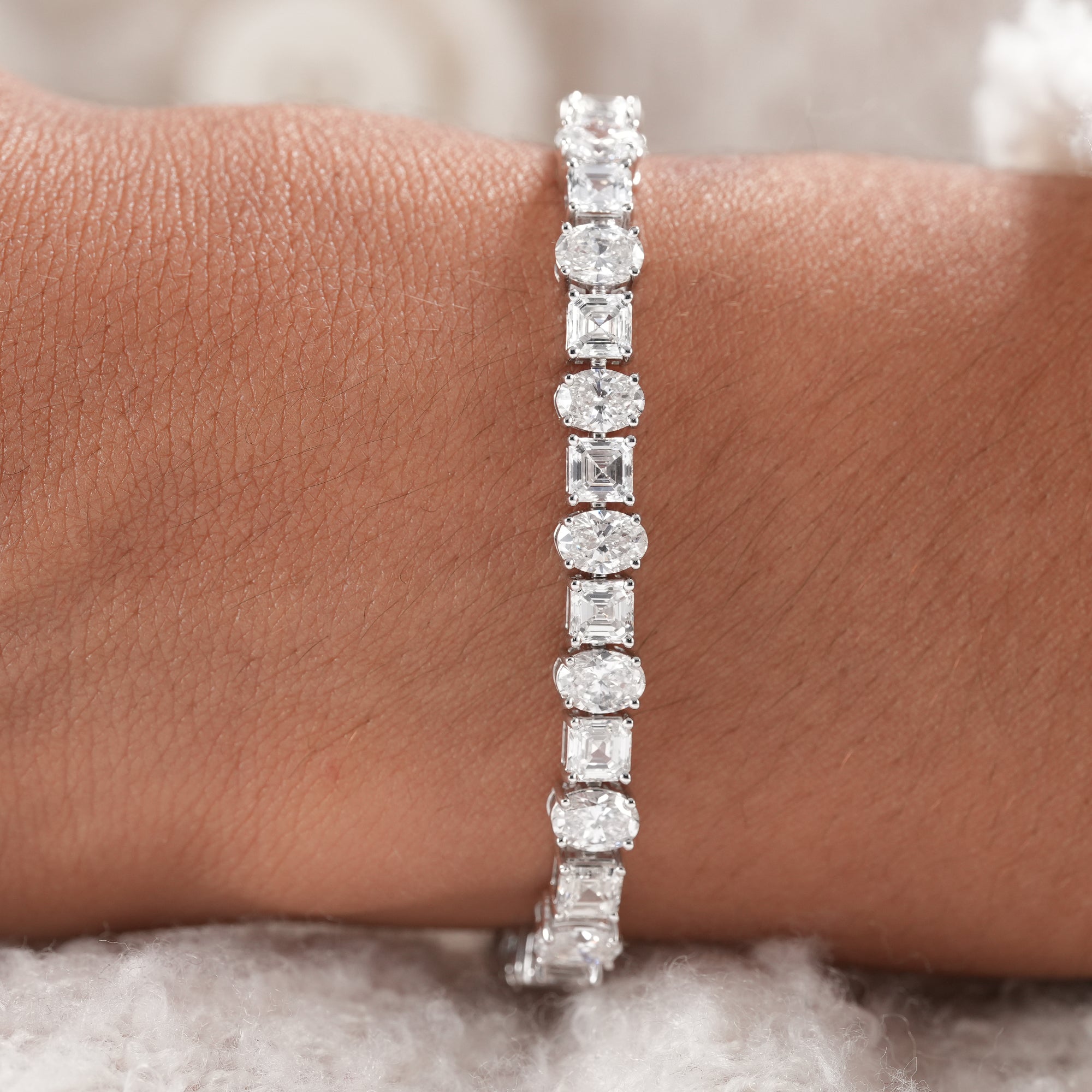 Luxury lab diamond bracelet with alternating oval and asscher diamonds.