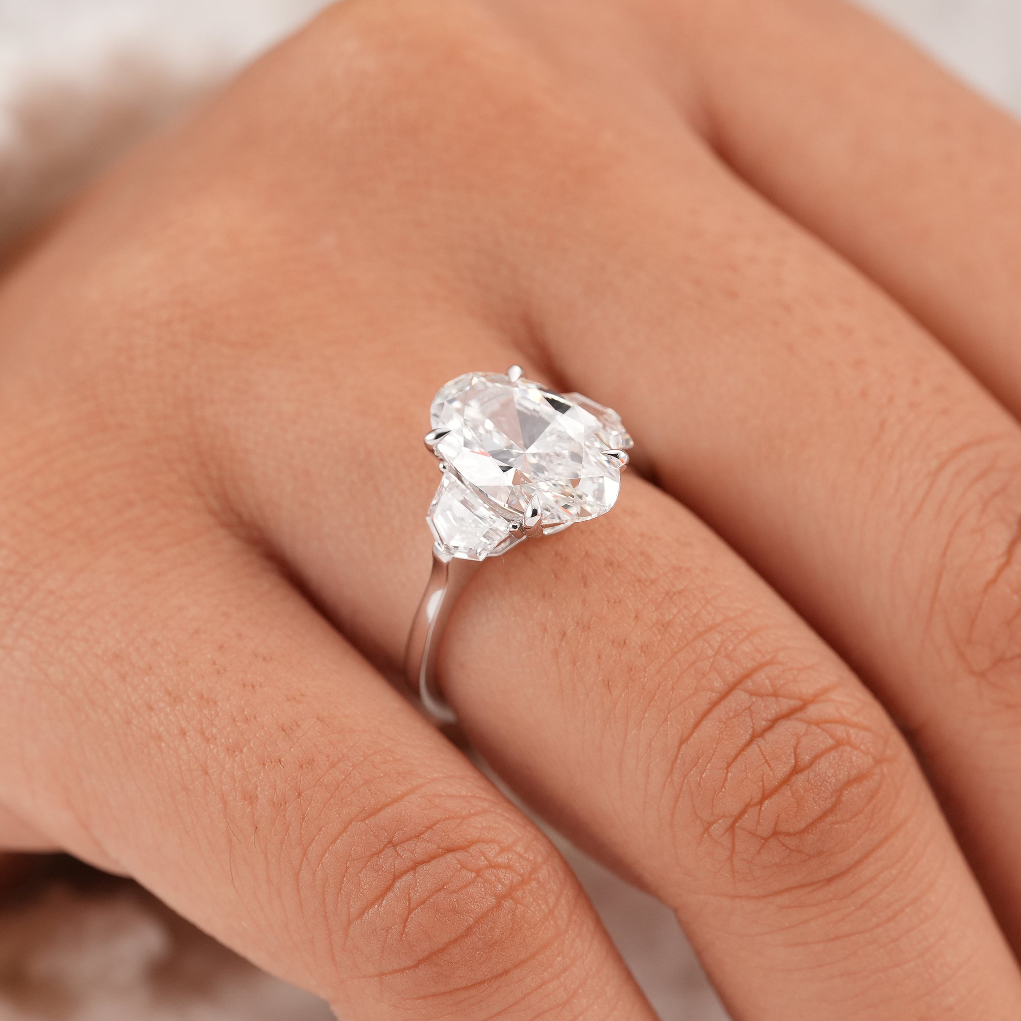Past present future oval diamond ring handcrafted in precious metal