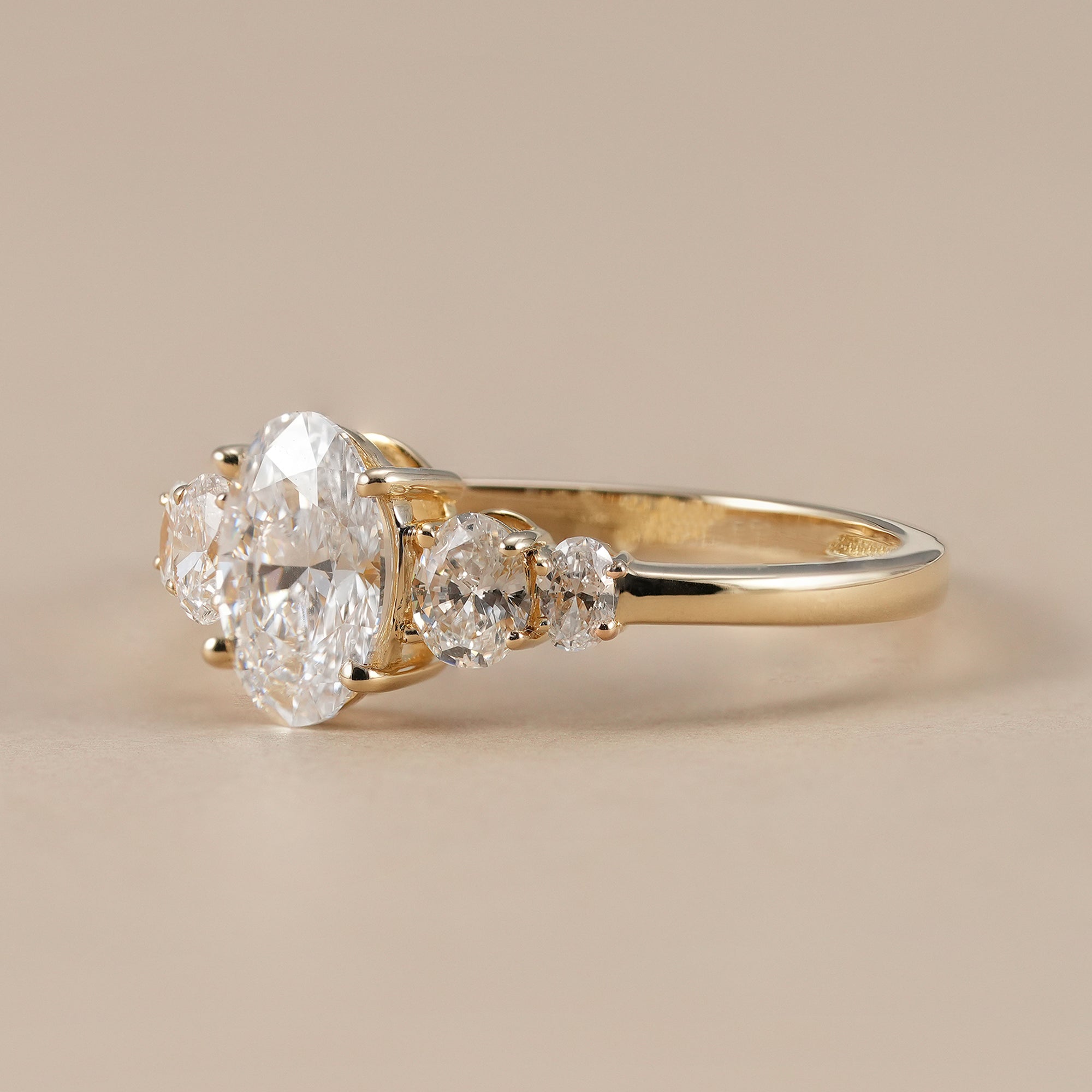 IGI certified oval diamond bridal ring with five oval diamonds