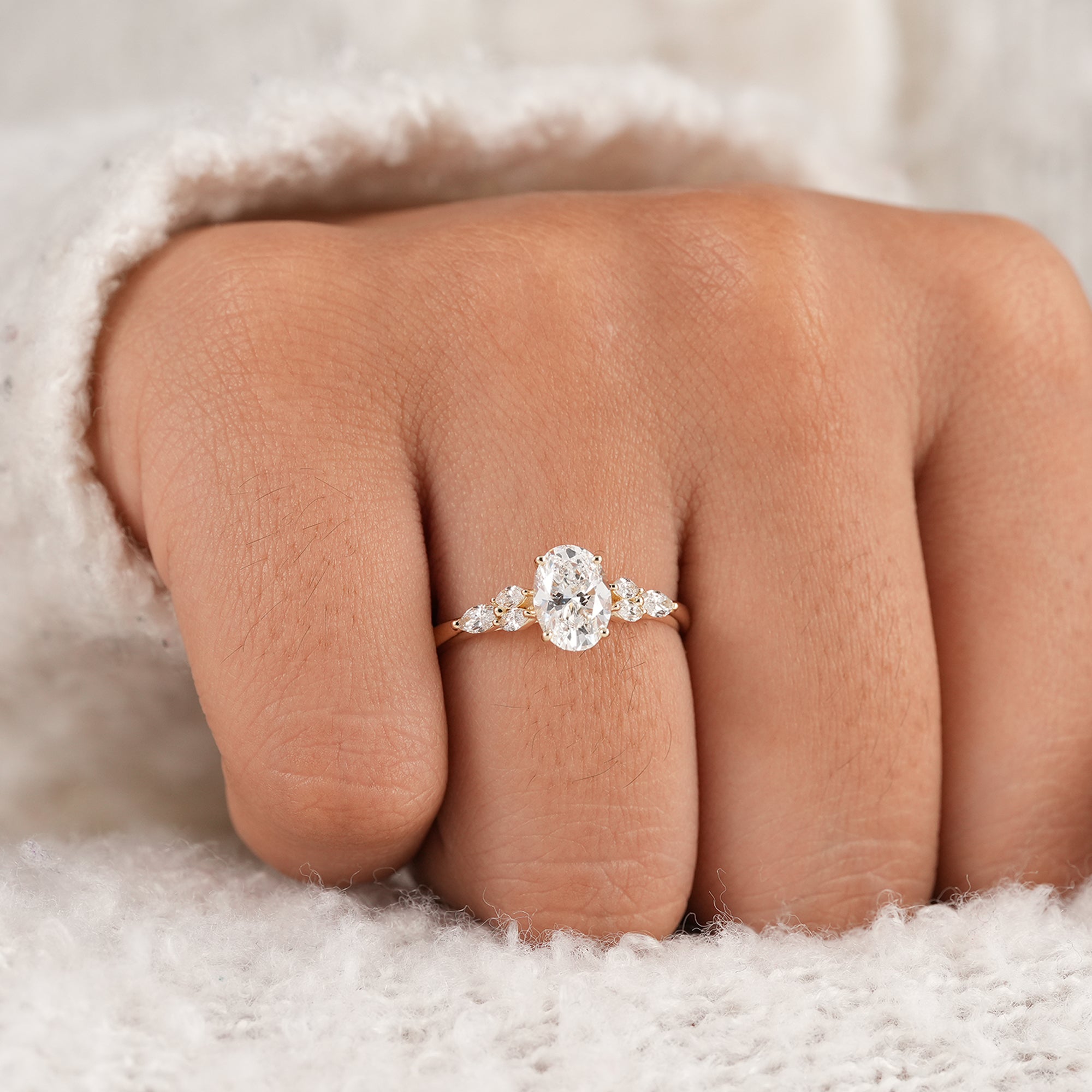 Women's oval floral engagement ring with IGI certified diamond