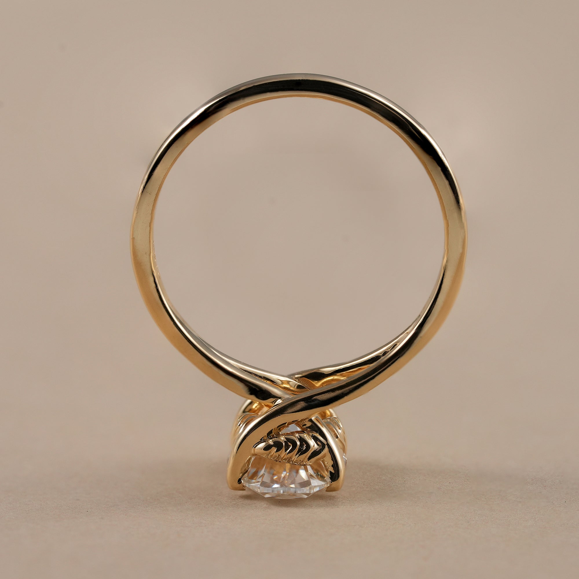 Modern oval diamond anniversary ring in yellow gold