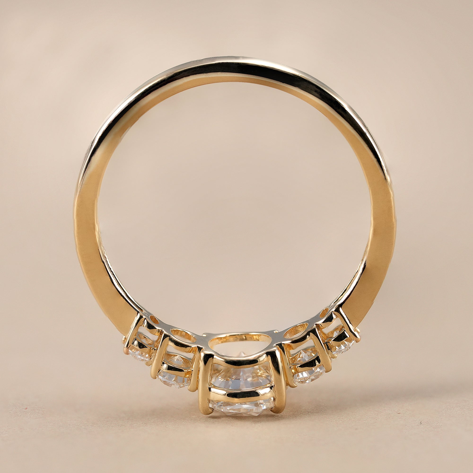 Women's oval five stone bridal ring with IGI certified diamonds