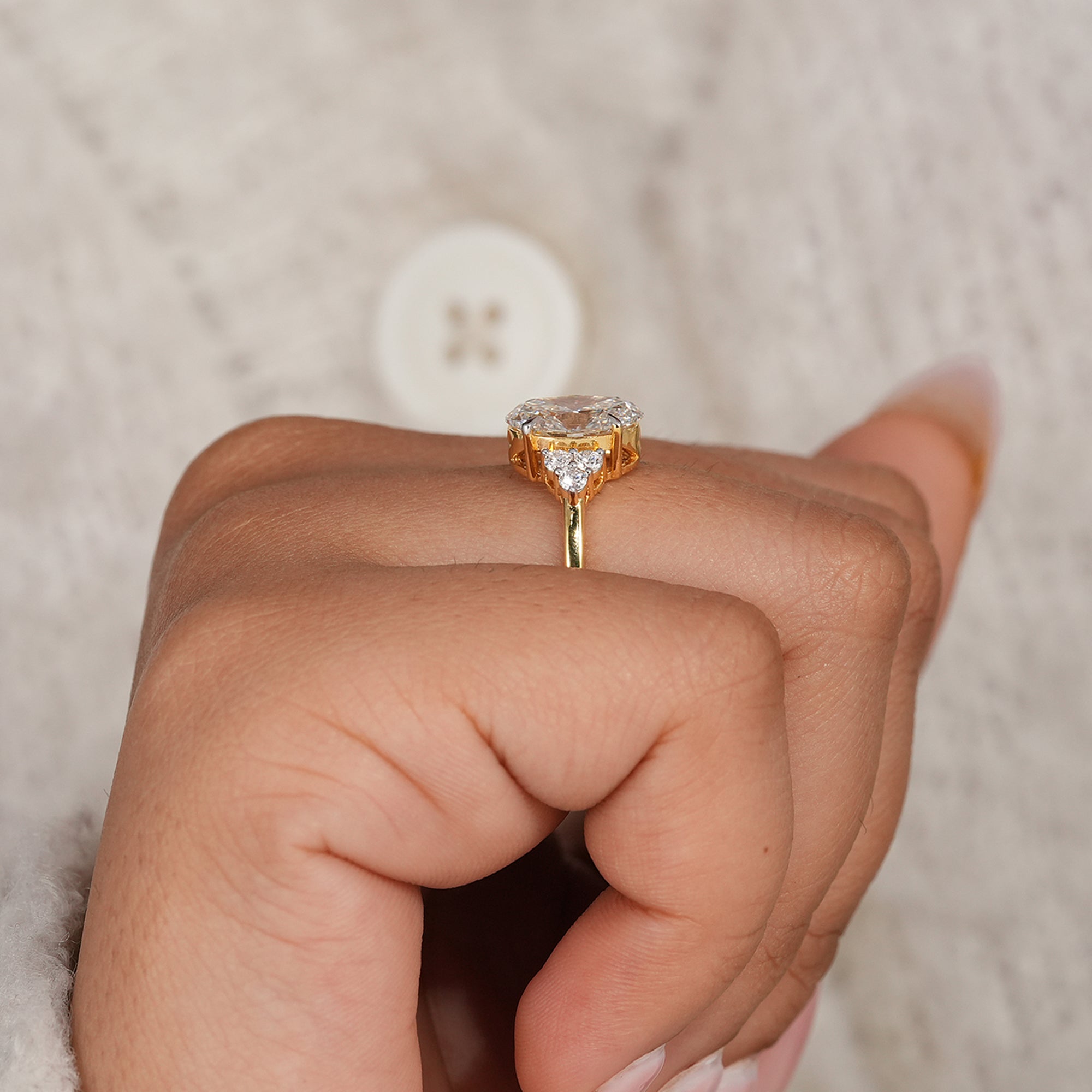 Women's oval lab grown diamond cluster ring in solid gold