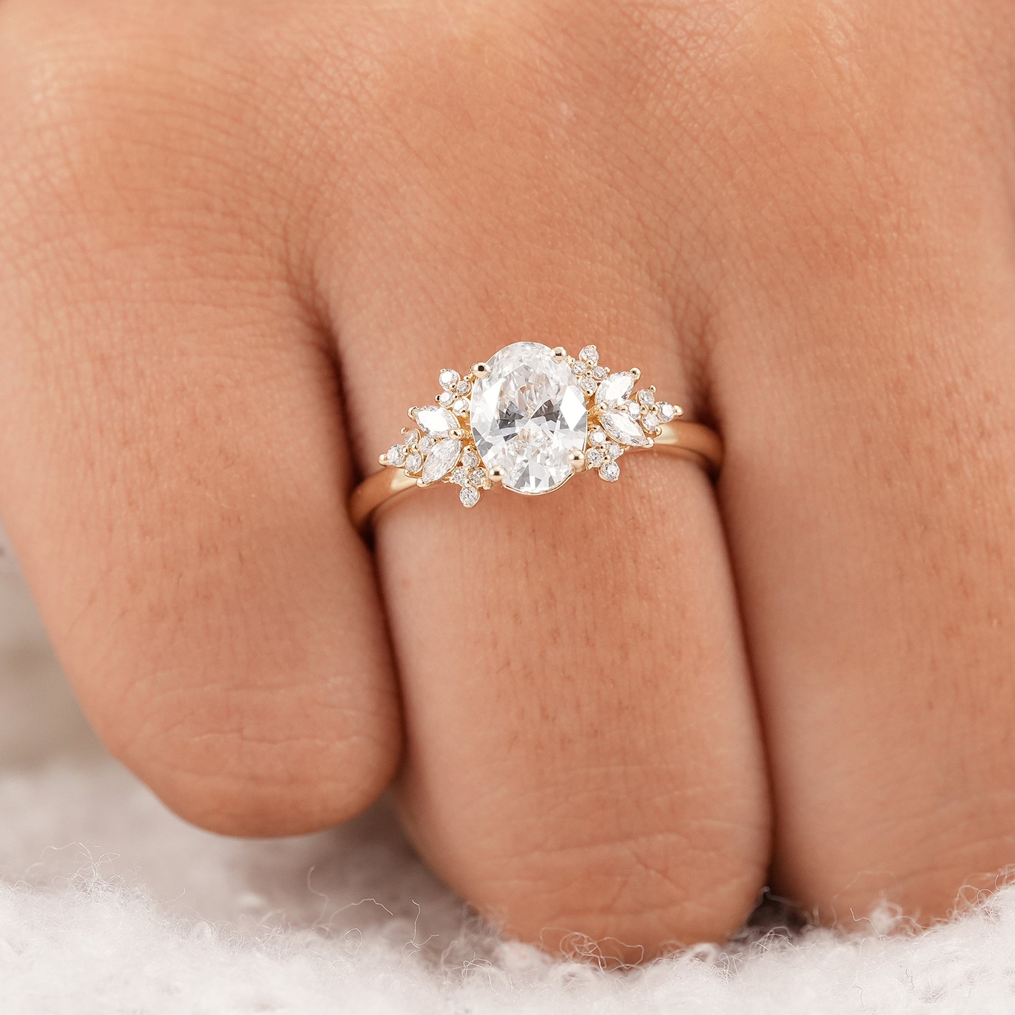 Timeless oval floral engagement ring featuring ethically grown lab diamonds
