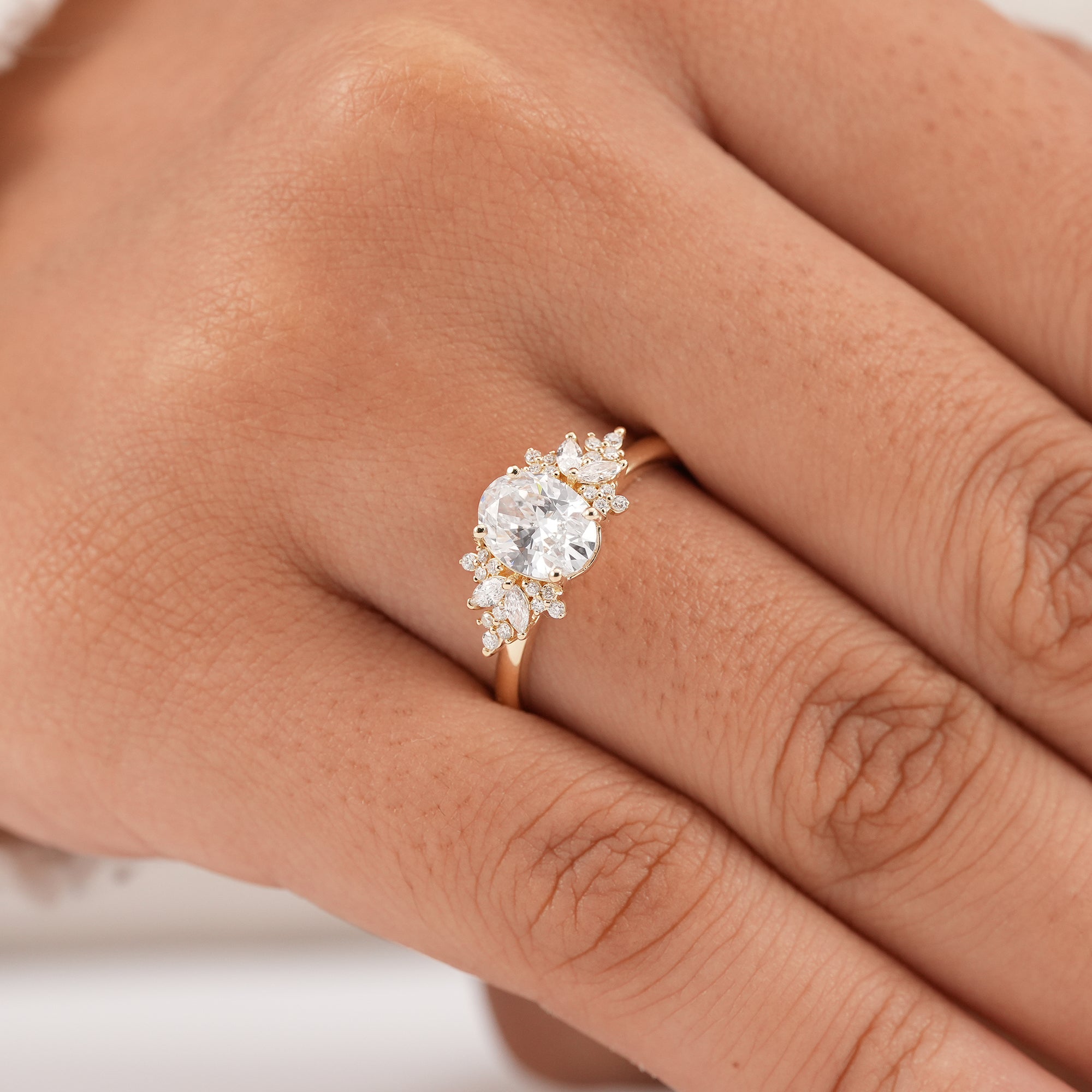 Oval lab diamond cocktail ring with marquise and round cluster design