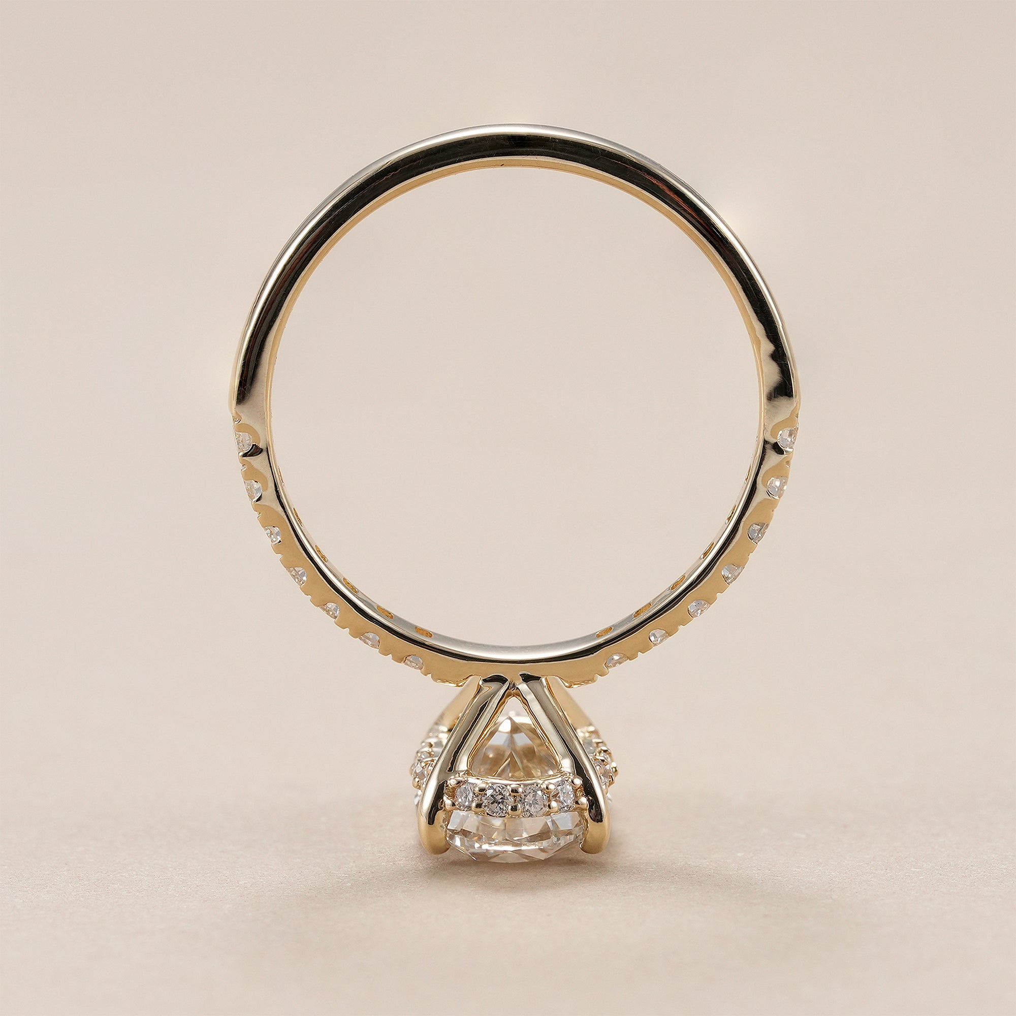 Luxury oval lab diamond ring with sparkling pavé band.