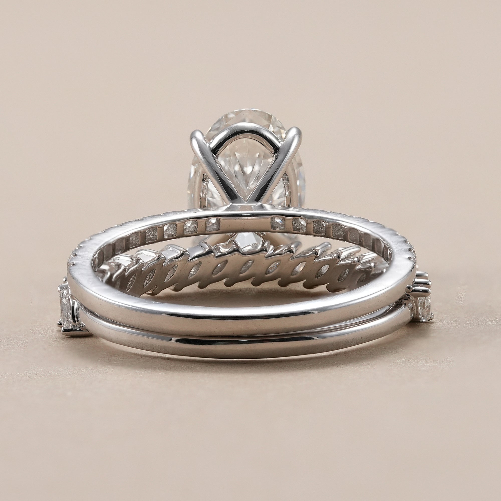 Stackable oval diamond bridal ring set handcrafted in white gold.