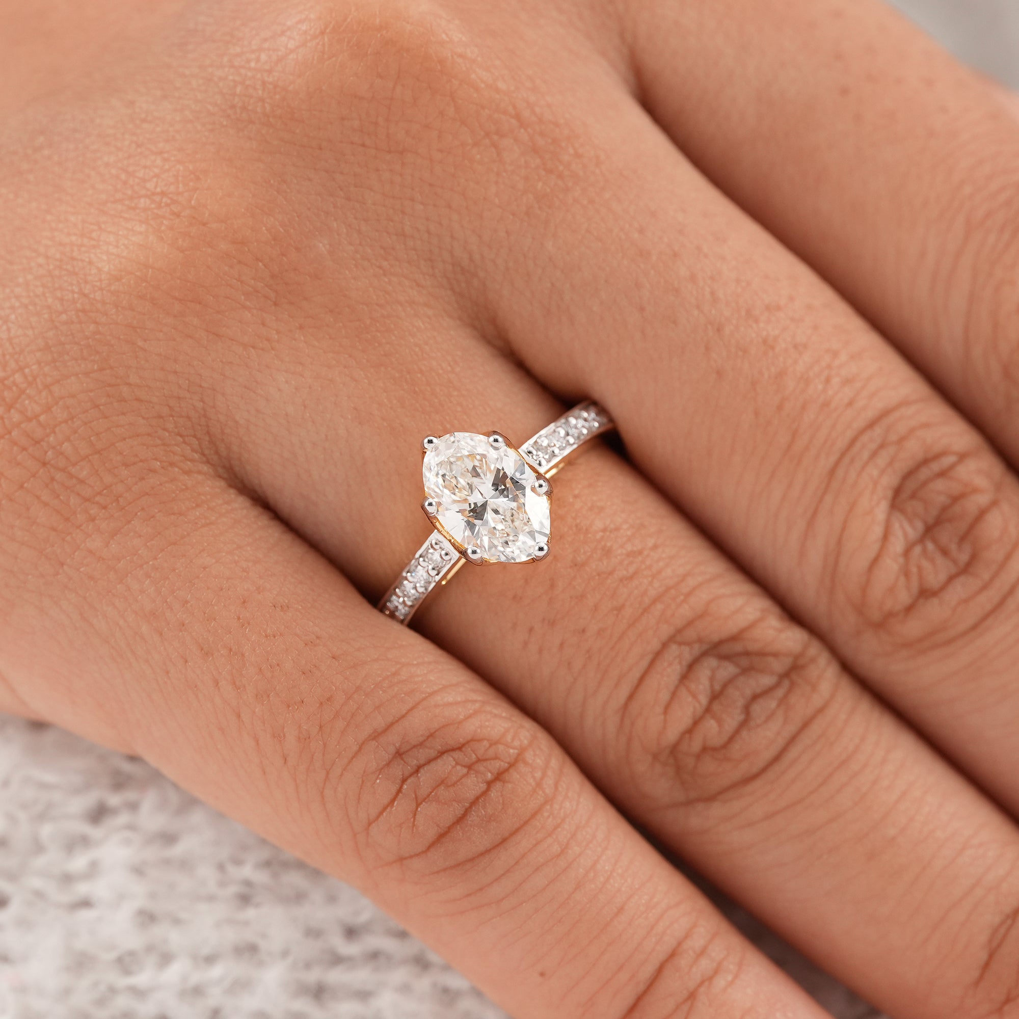 Oval lab diamond wedding ring handcrafted in yellow gold
