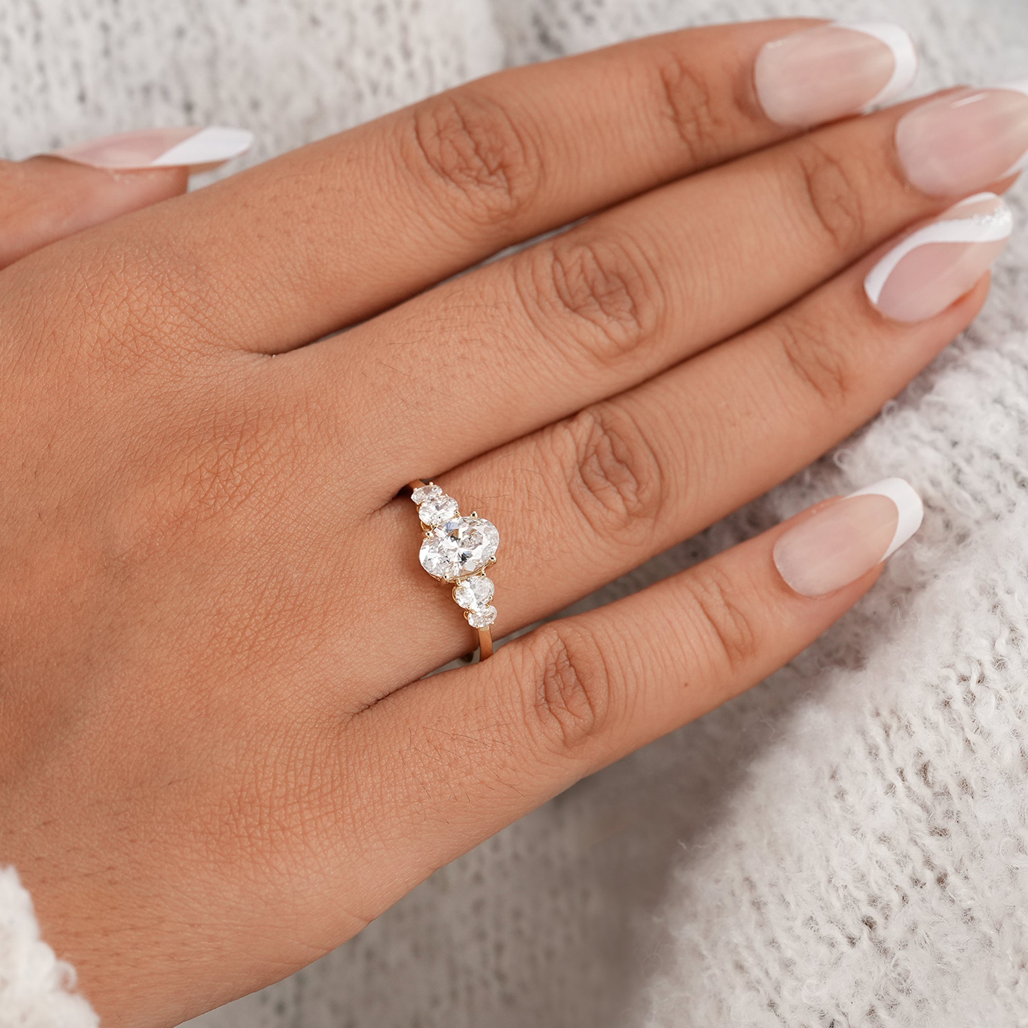 Fine jewelry oval engagement ring with oval side diamonds
