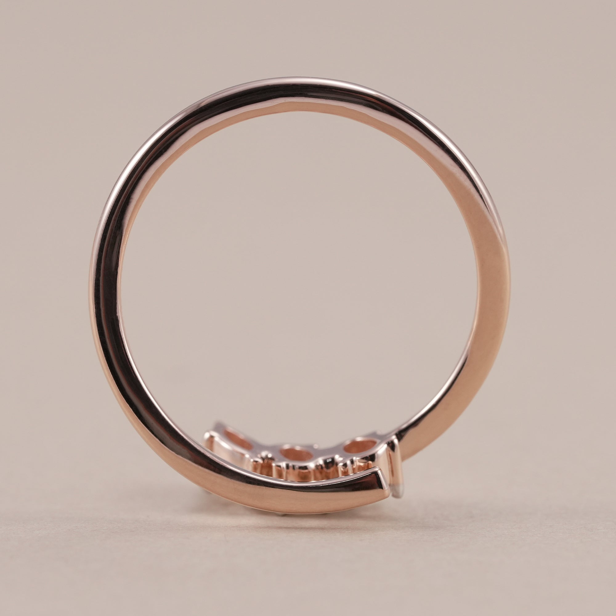 Modern open bridal band with oval diamond center