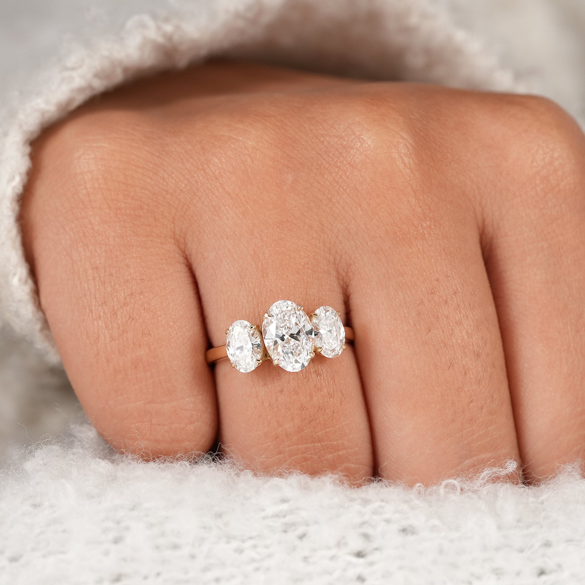 Past present future oval diamond engagement ring