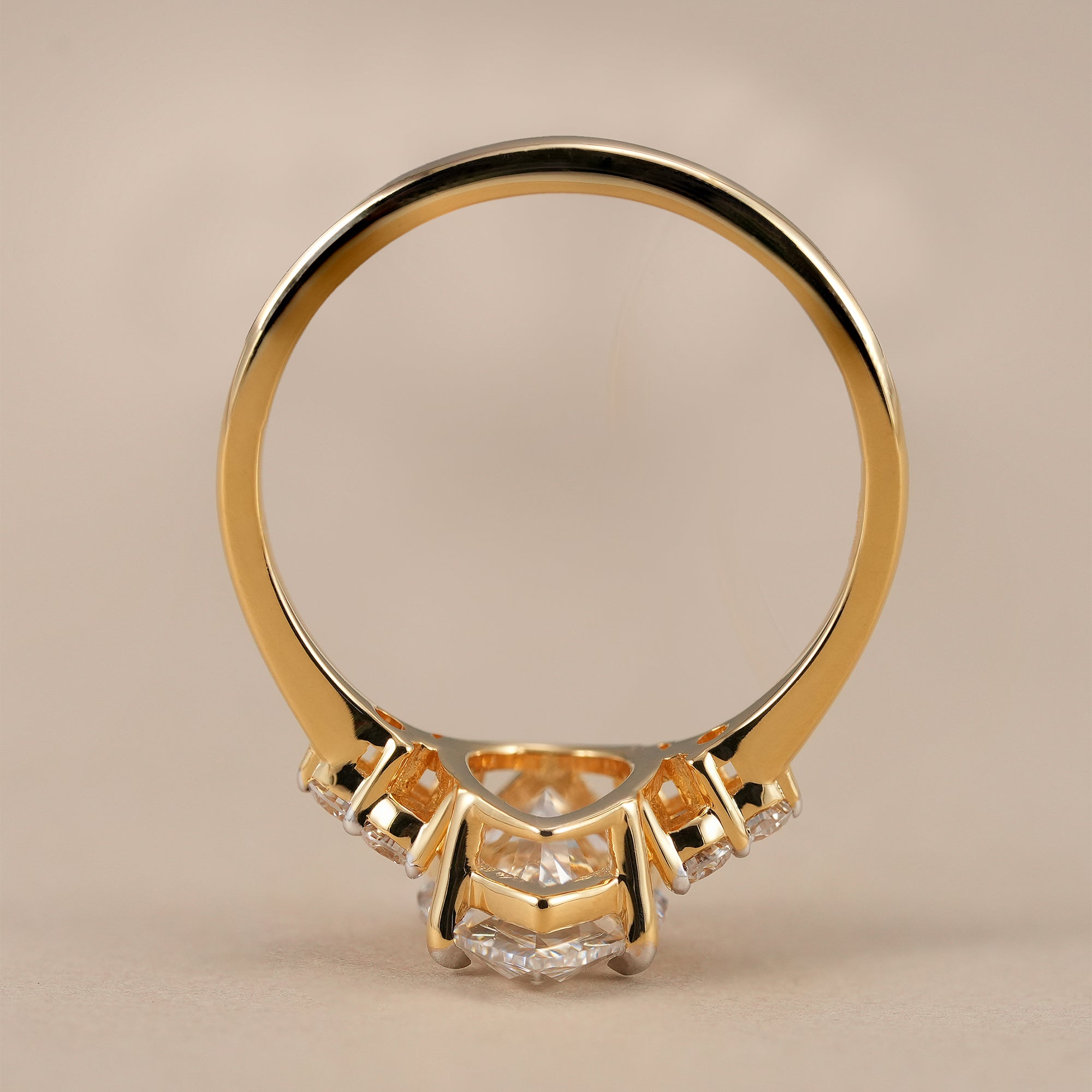 Pear cut lab grown diamond ring with sparkling side stones