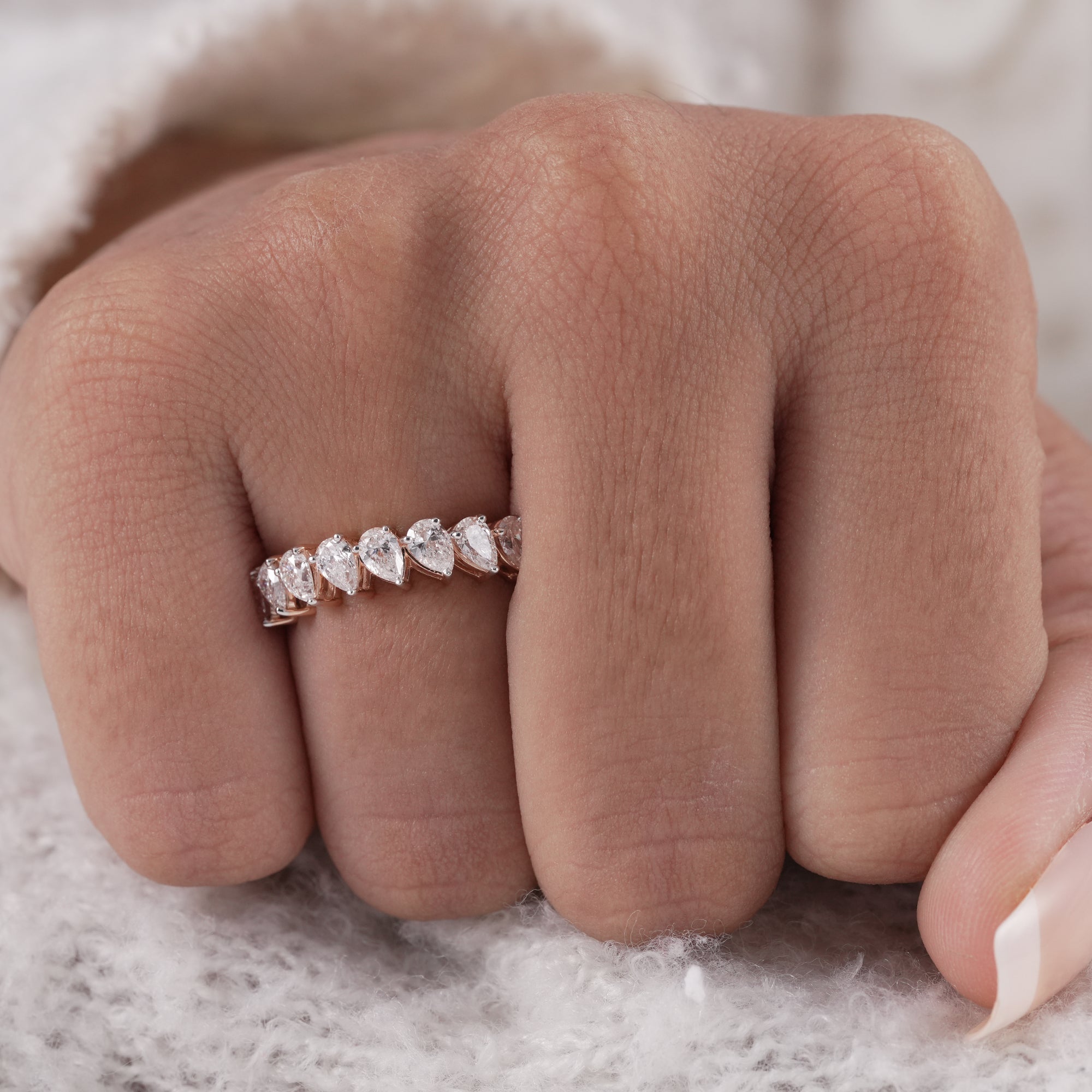 Stackable pear diamond band with brilliant sparkle