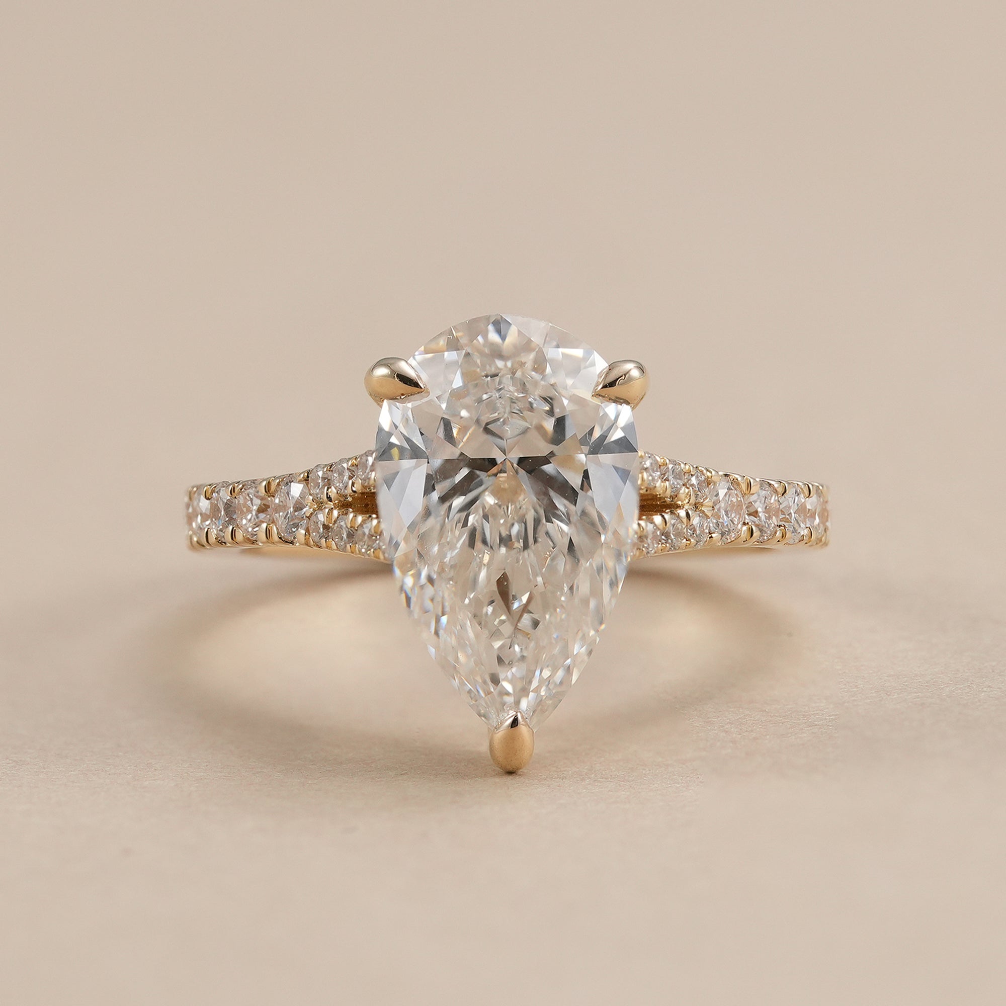 3 CT pear lab diamond ring with split shank diamond band
