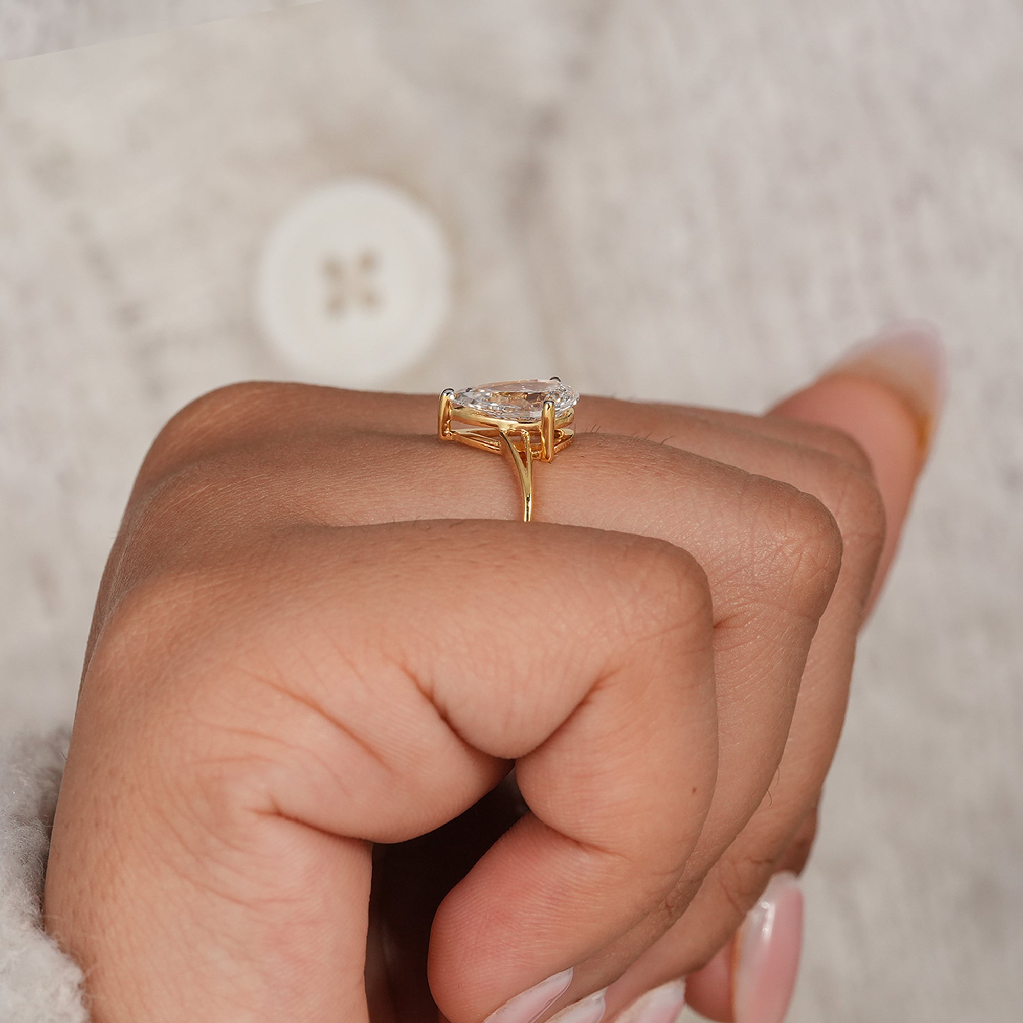Pear solitaire lab diamond ring with elegant curved band