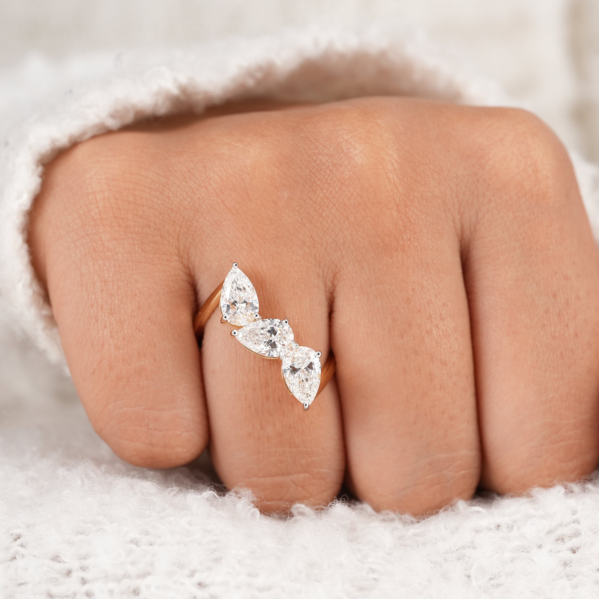 Twisted pear diamond ring handcrafted in solid gold