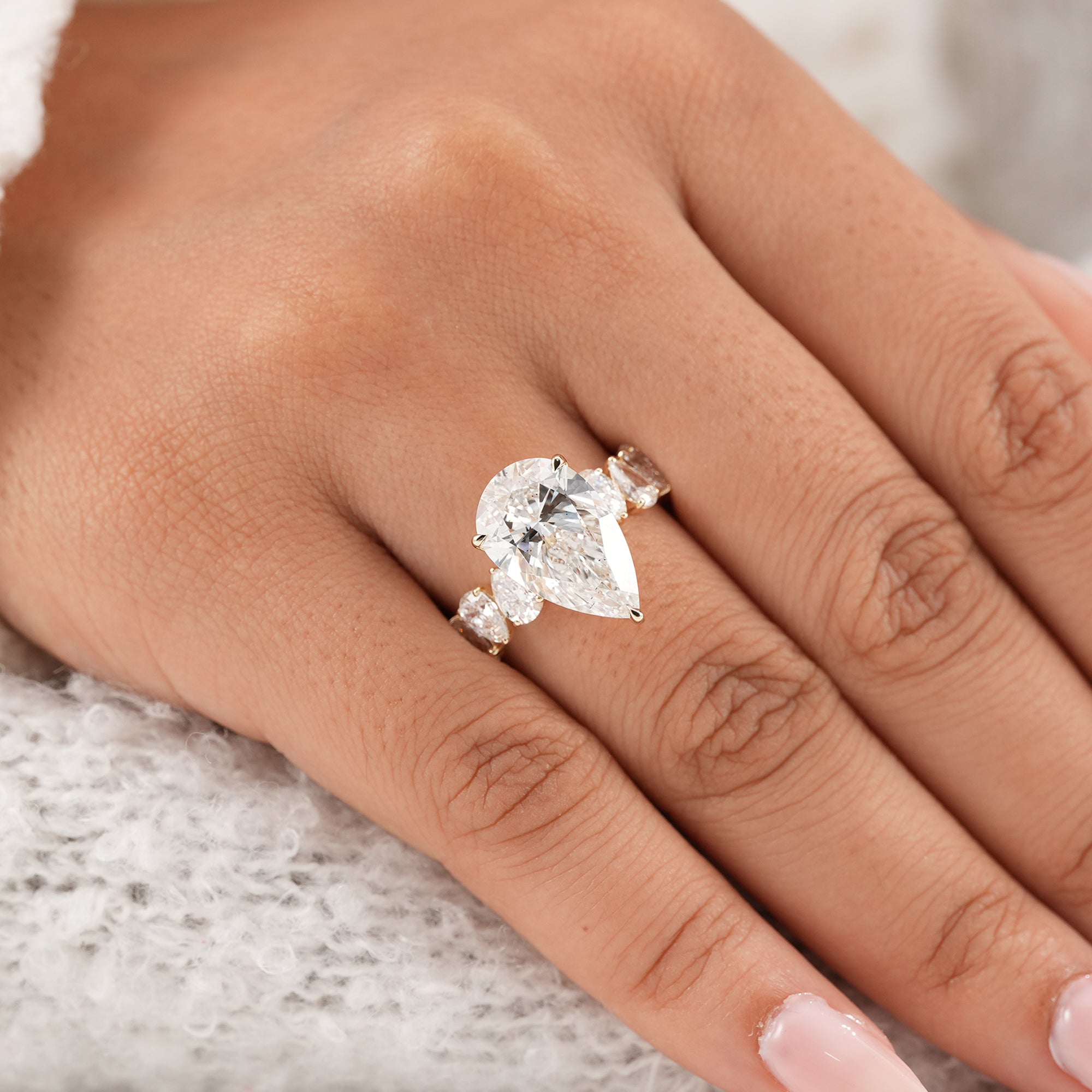 Elegant pear diamond bridal ring with accent diamonds
