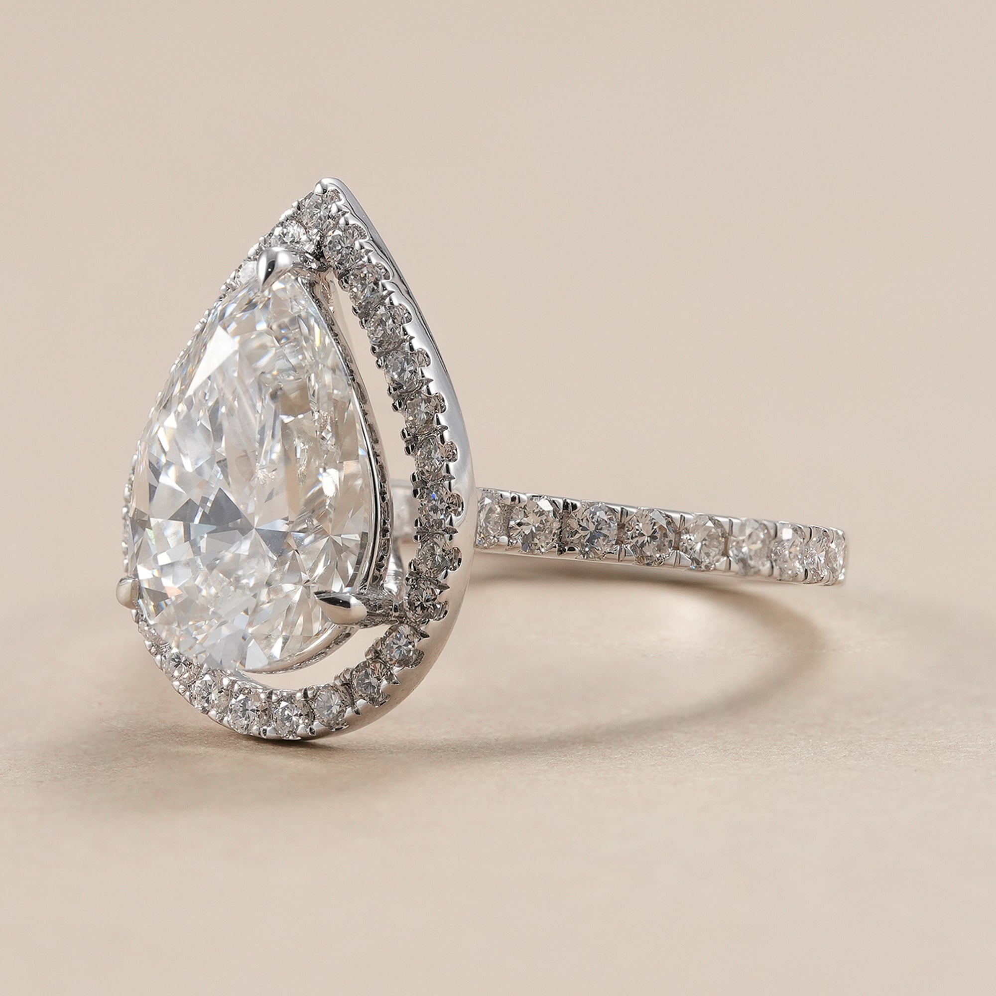 IGI certified pear diamond engagement ring in white gold.