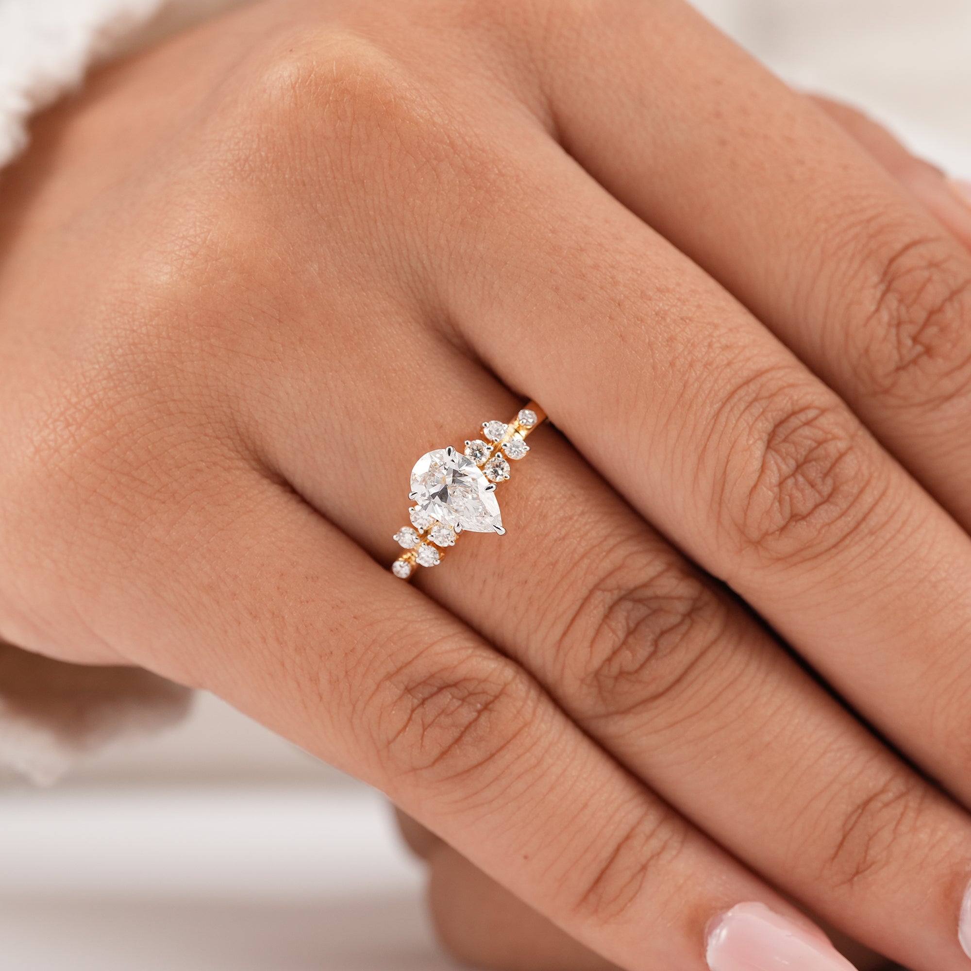 Luxury pear cut lab diamond ring with accent stones