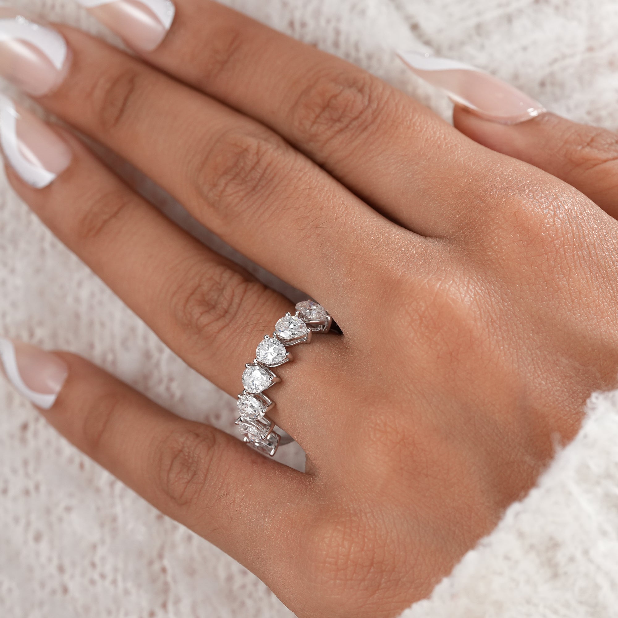 Luxury seven stone pear diamond ring for women.
