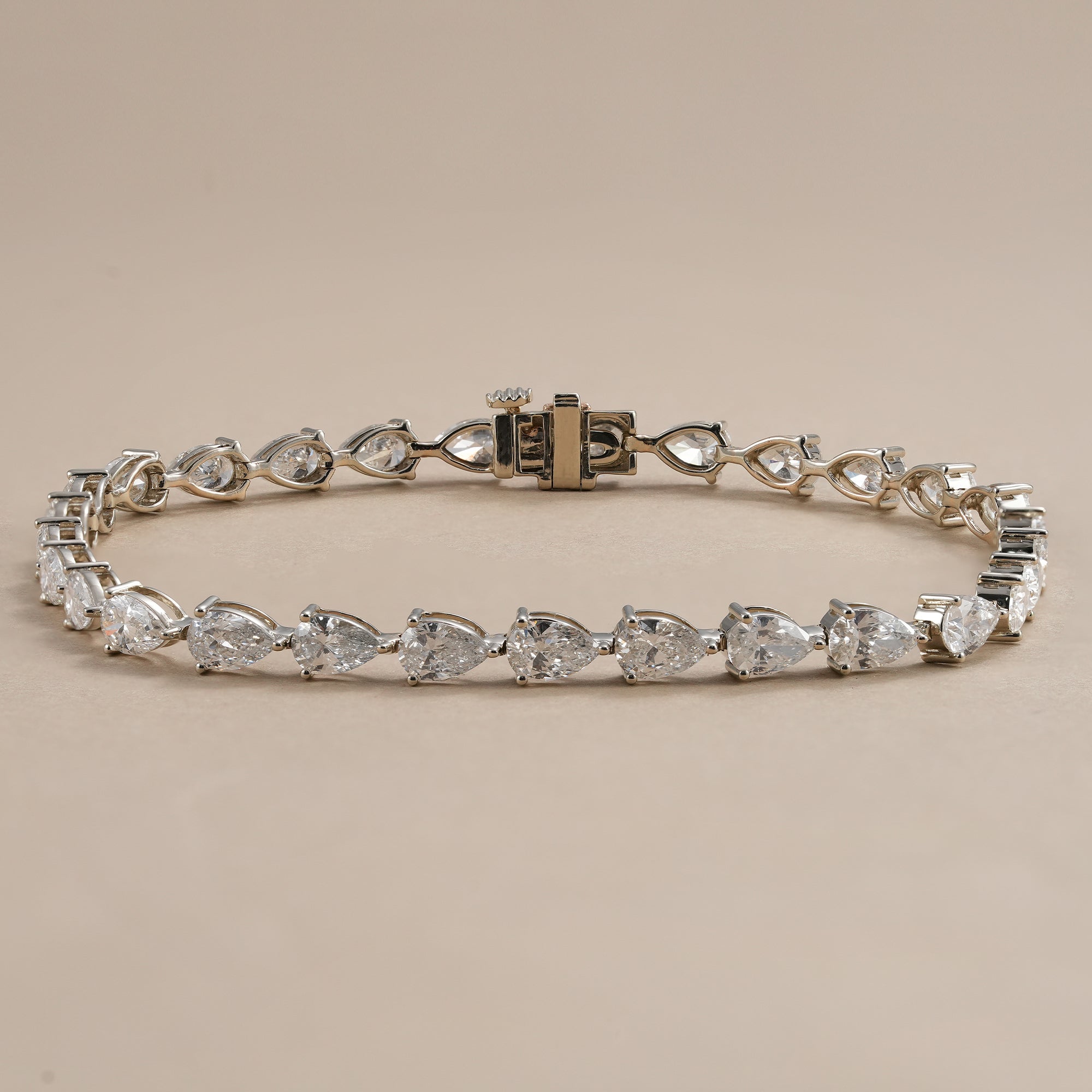 Pear lab diamond tennis bracelet with brilliant pear-shaped lab grown diamonds.
