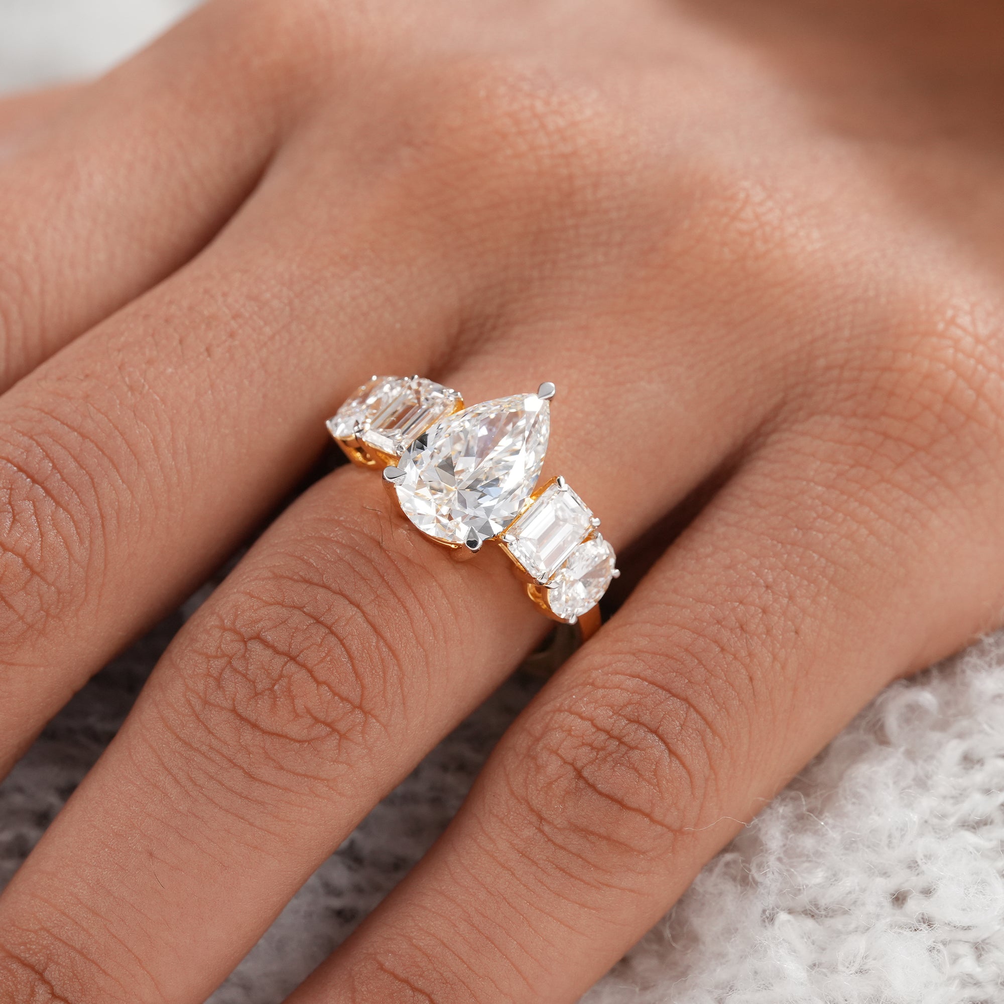Sustainable lab grown pear diamond bridal ring.