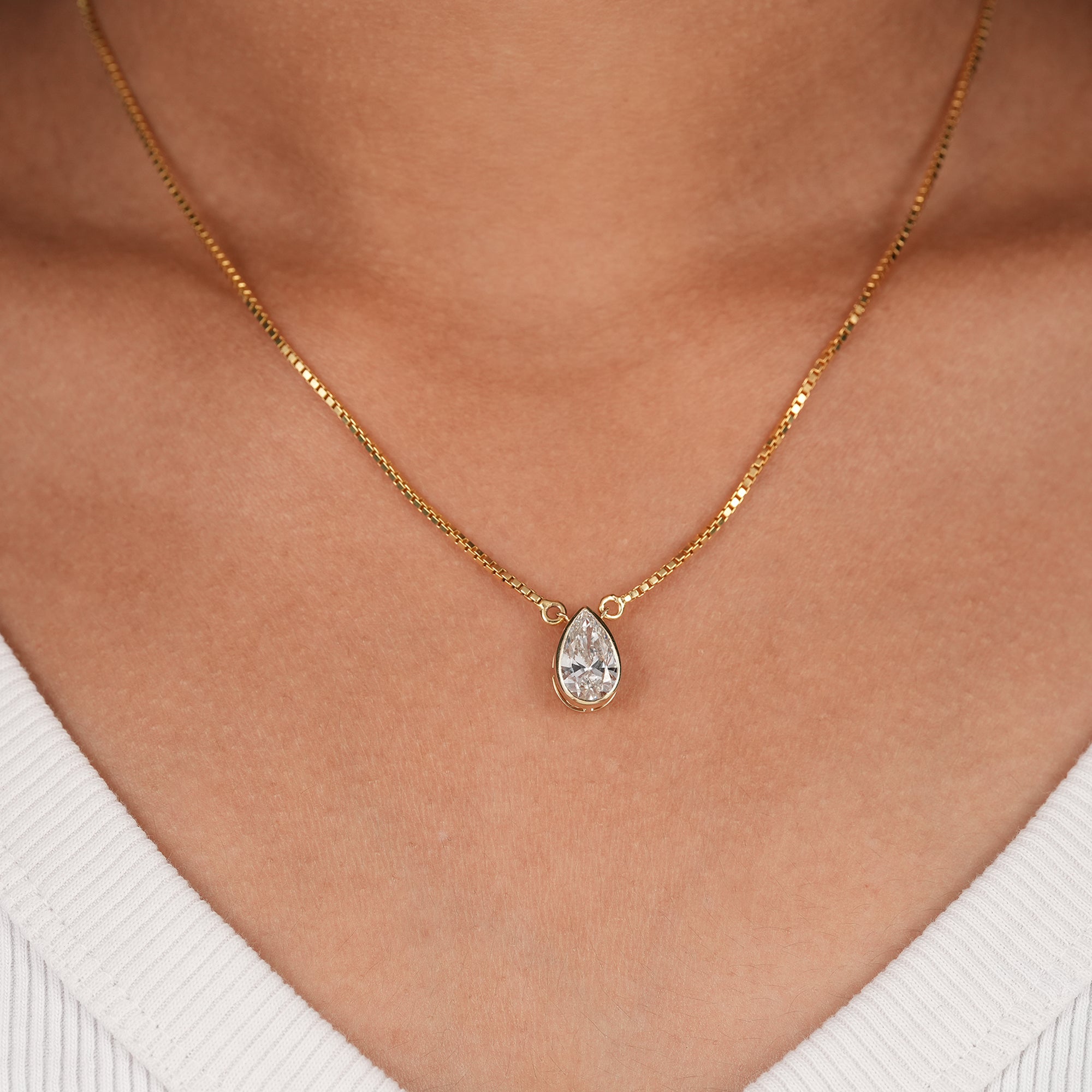 Pear lab grown diamond bezel pendant necklace in solid gold
