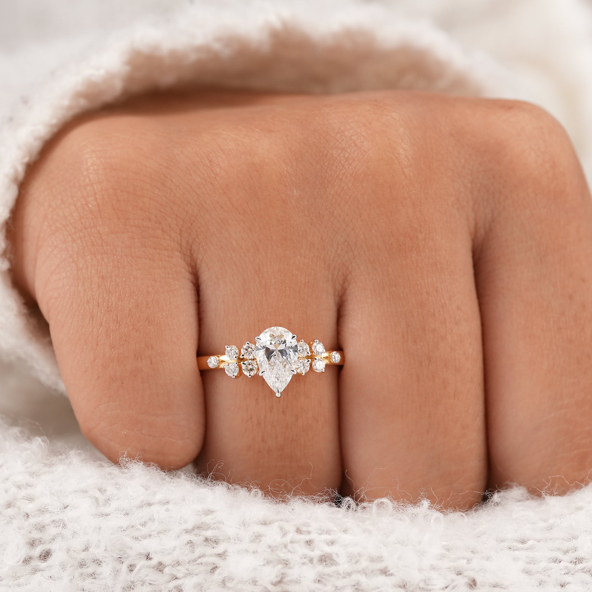 Pear lab grown diamond bridal ring with floral cluster design