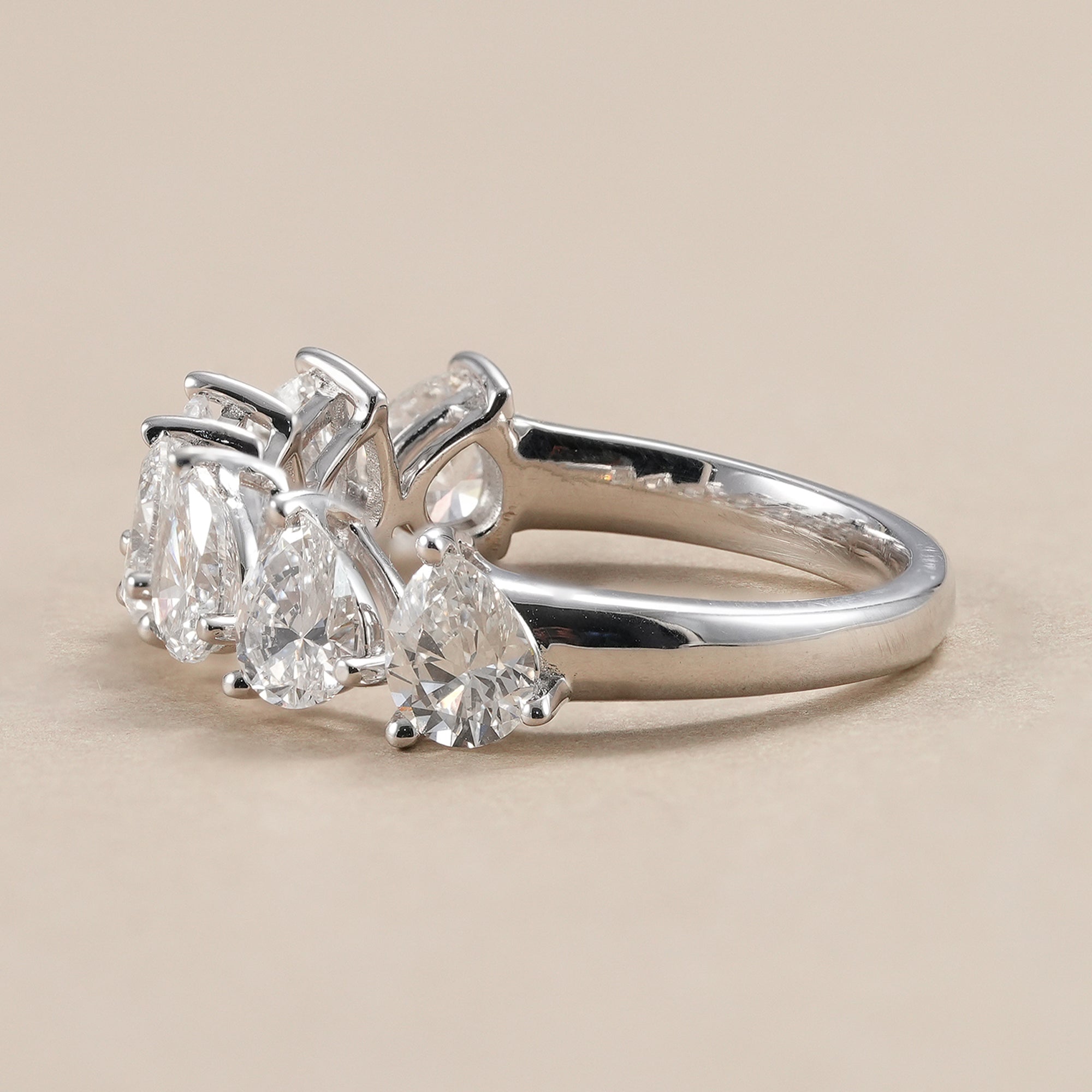 Stackable seven stone pear diamond anniversary band.