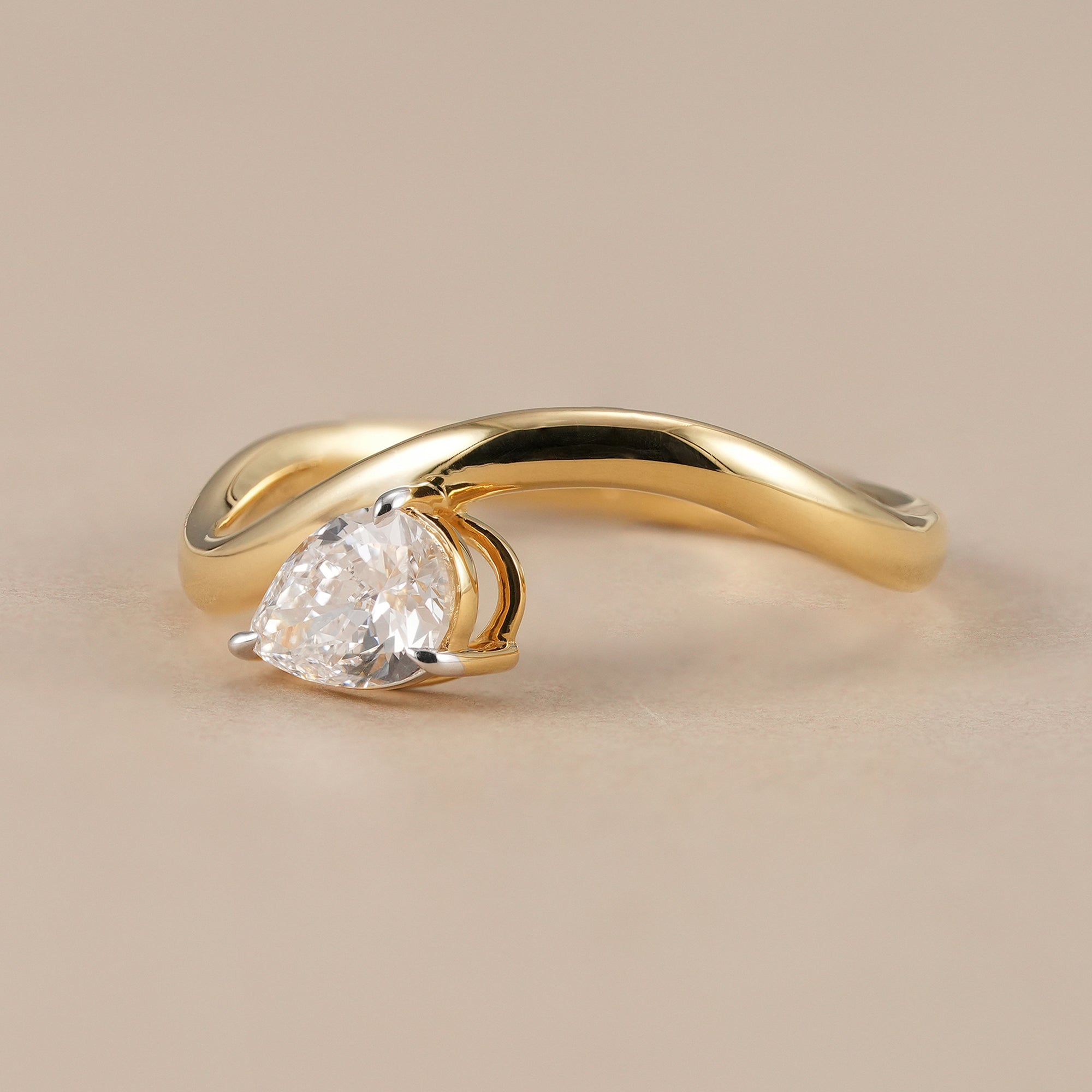 Curved pear solitaire wedding band for women