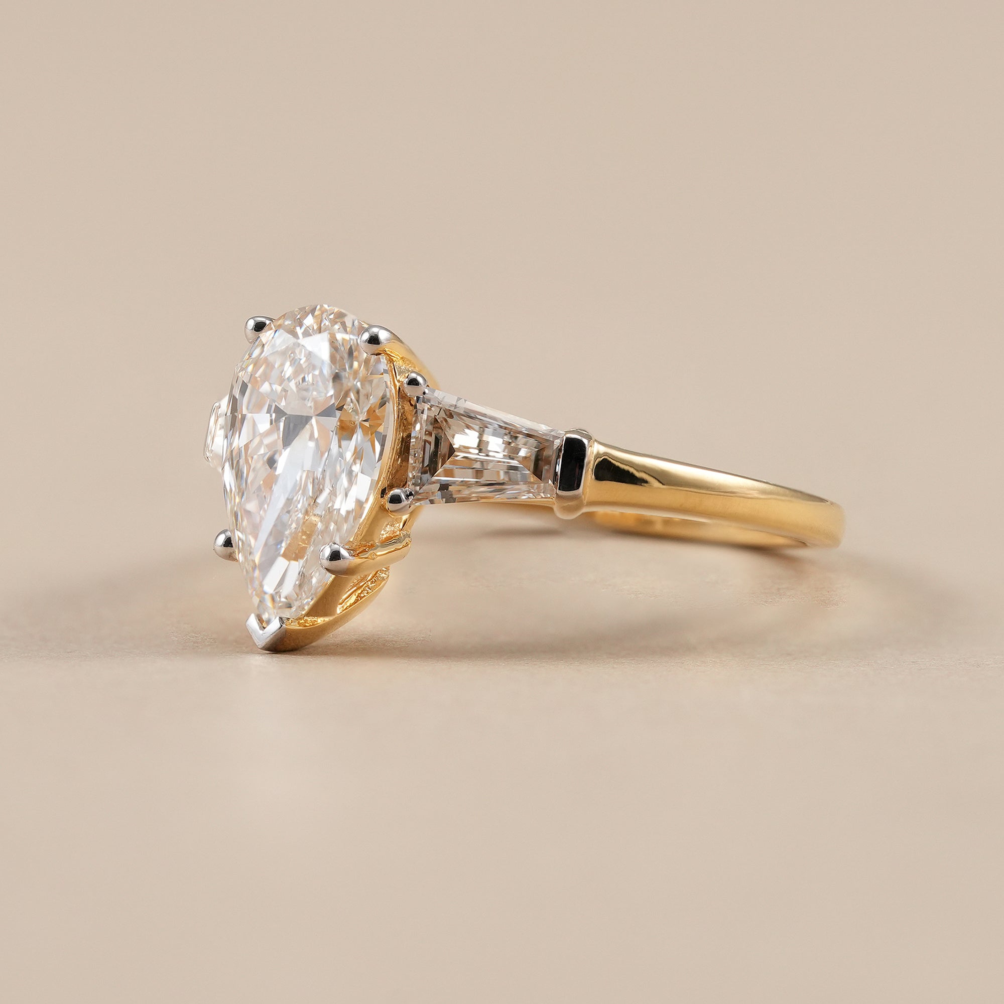 IGI certified pear lab grown diamond trilogy engagement ring