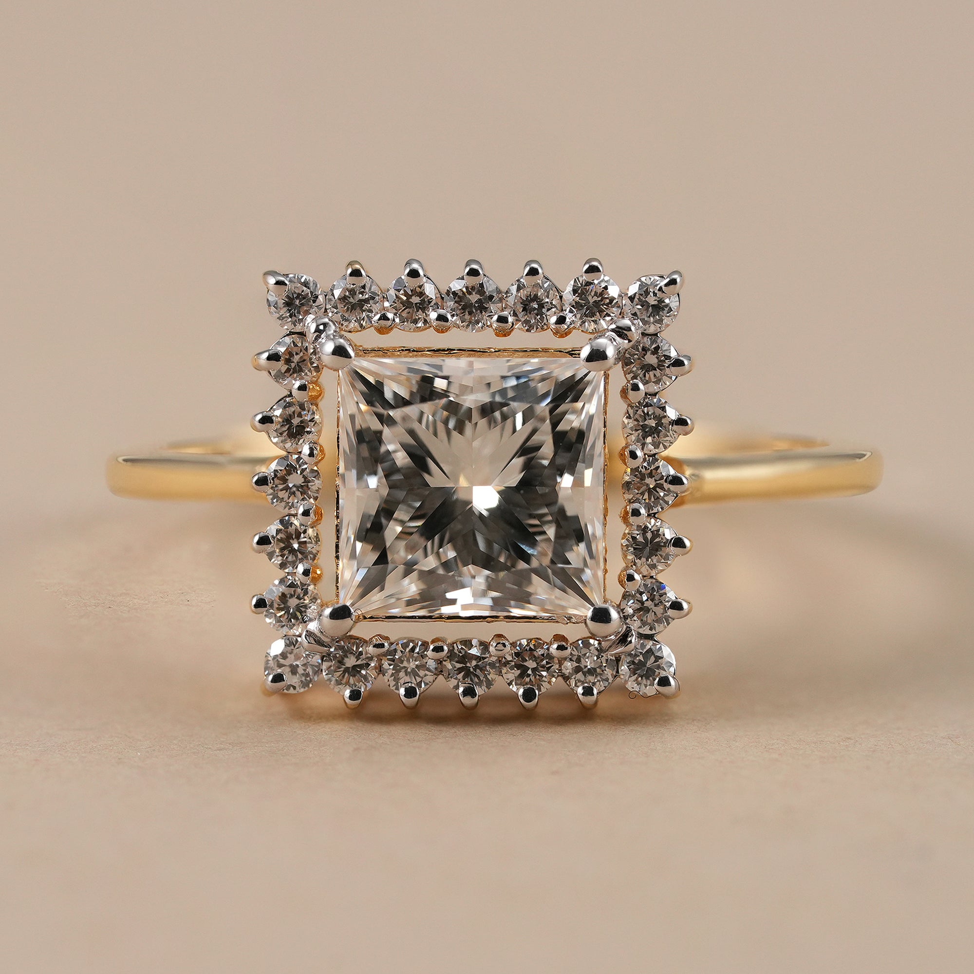 Princess cut lab grown diamond halo engagement ring in yellow gold