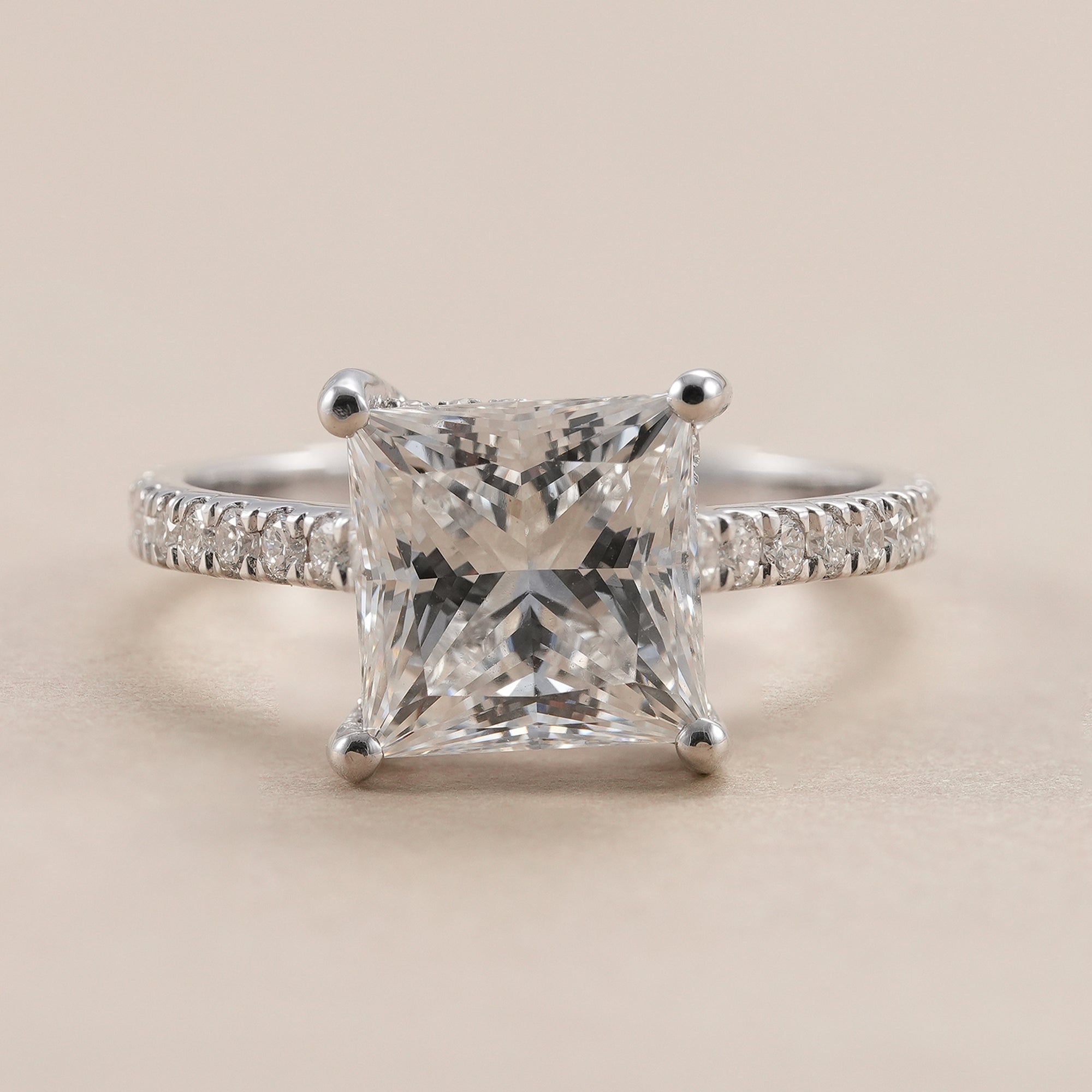 Princess diamond hidden halo ring with lab grown diamond in white gold.