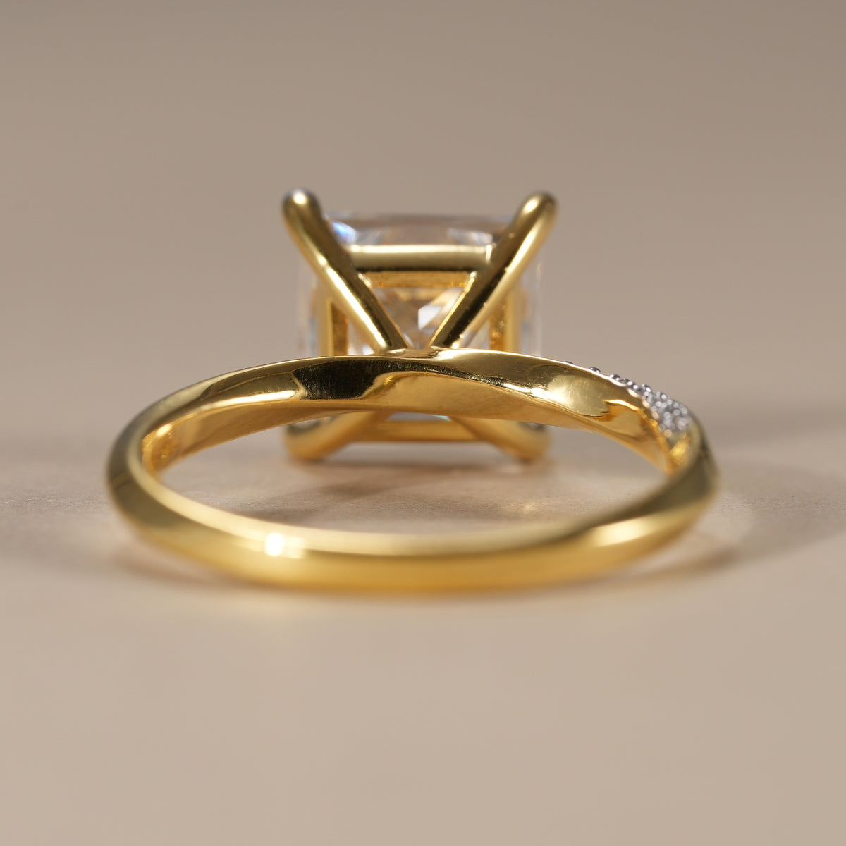 Luxury princess cut diamond ring with delicate twisted pavé band for timeless elegance.