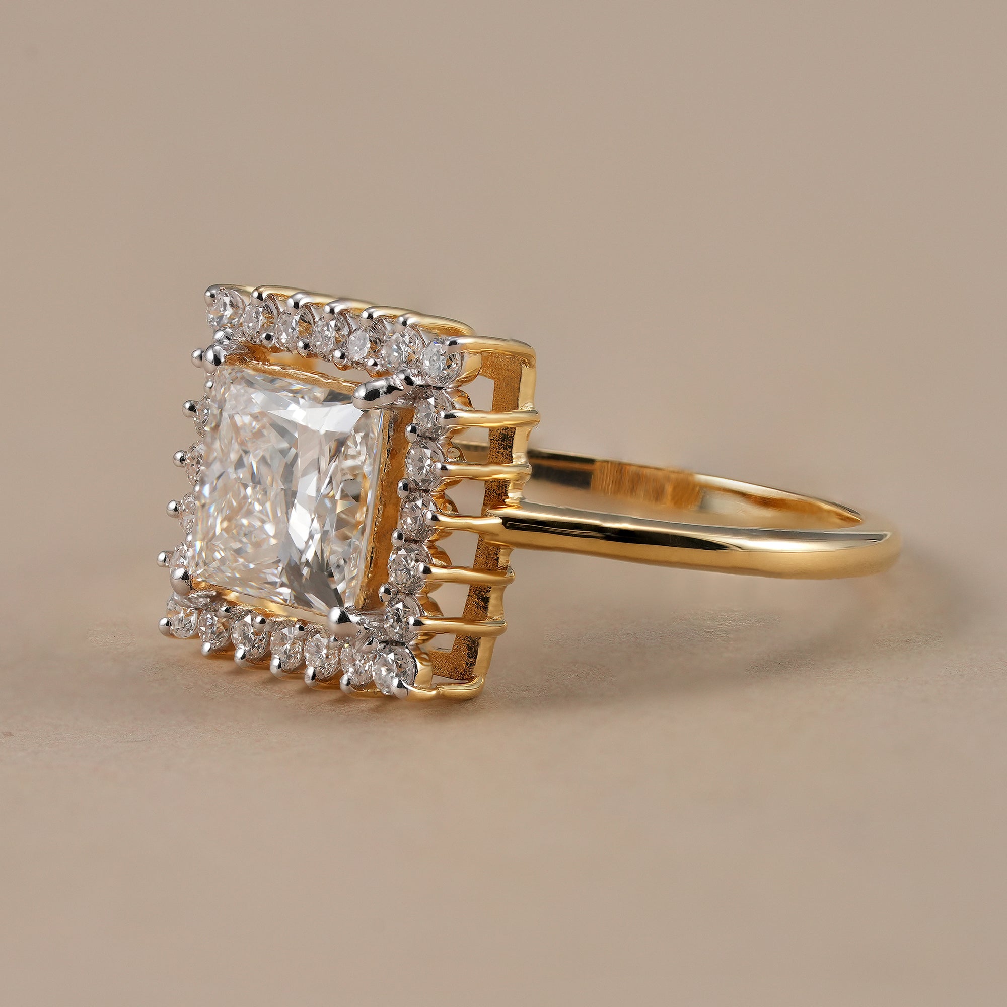 Princess halo diamond engagement ring with sparkling accent diamonds
