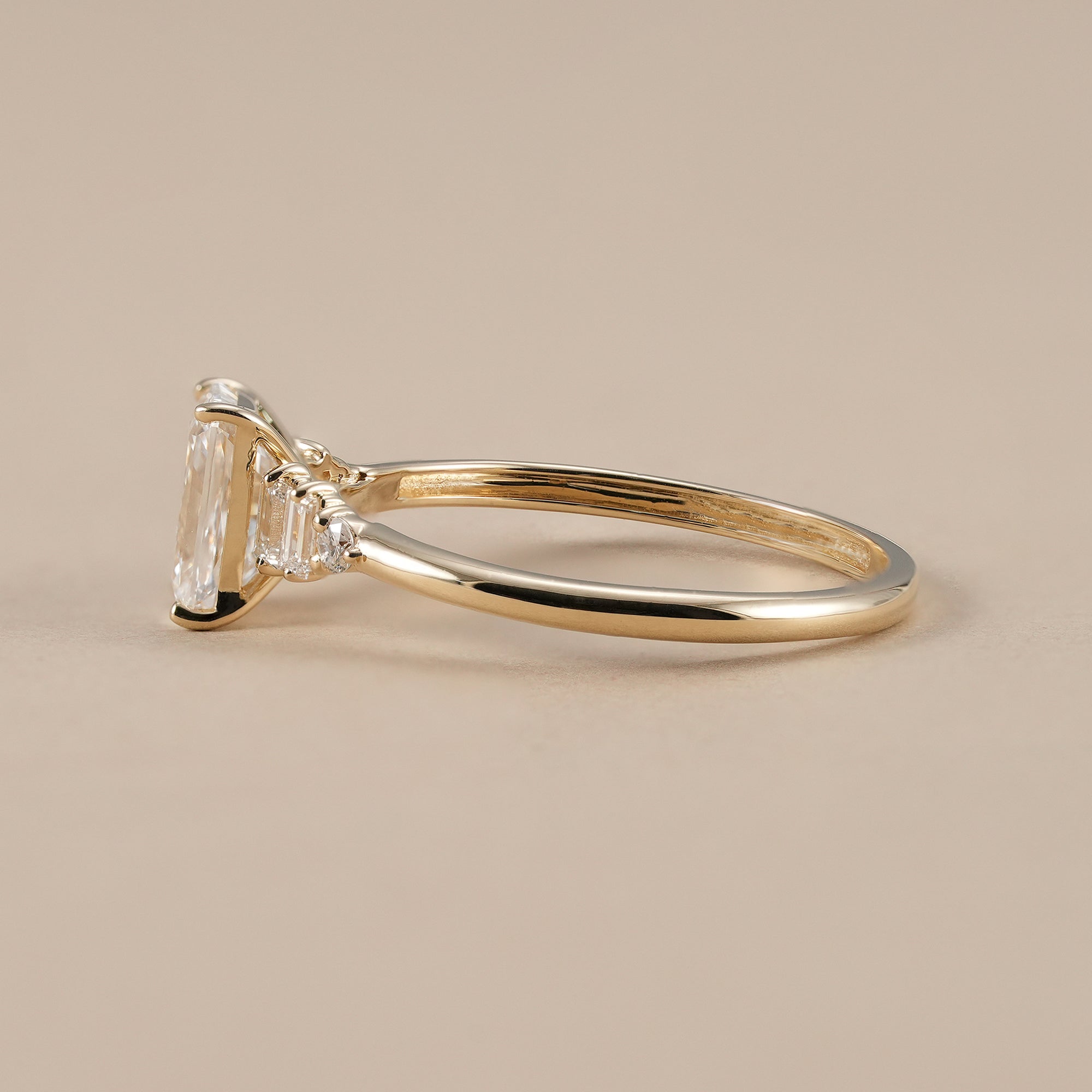 Radiant lab diamond ring with round accent diamonds