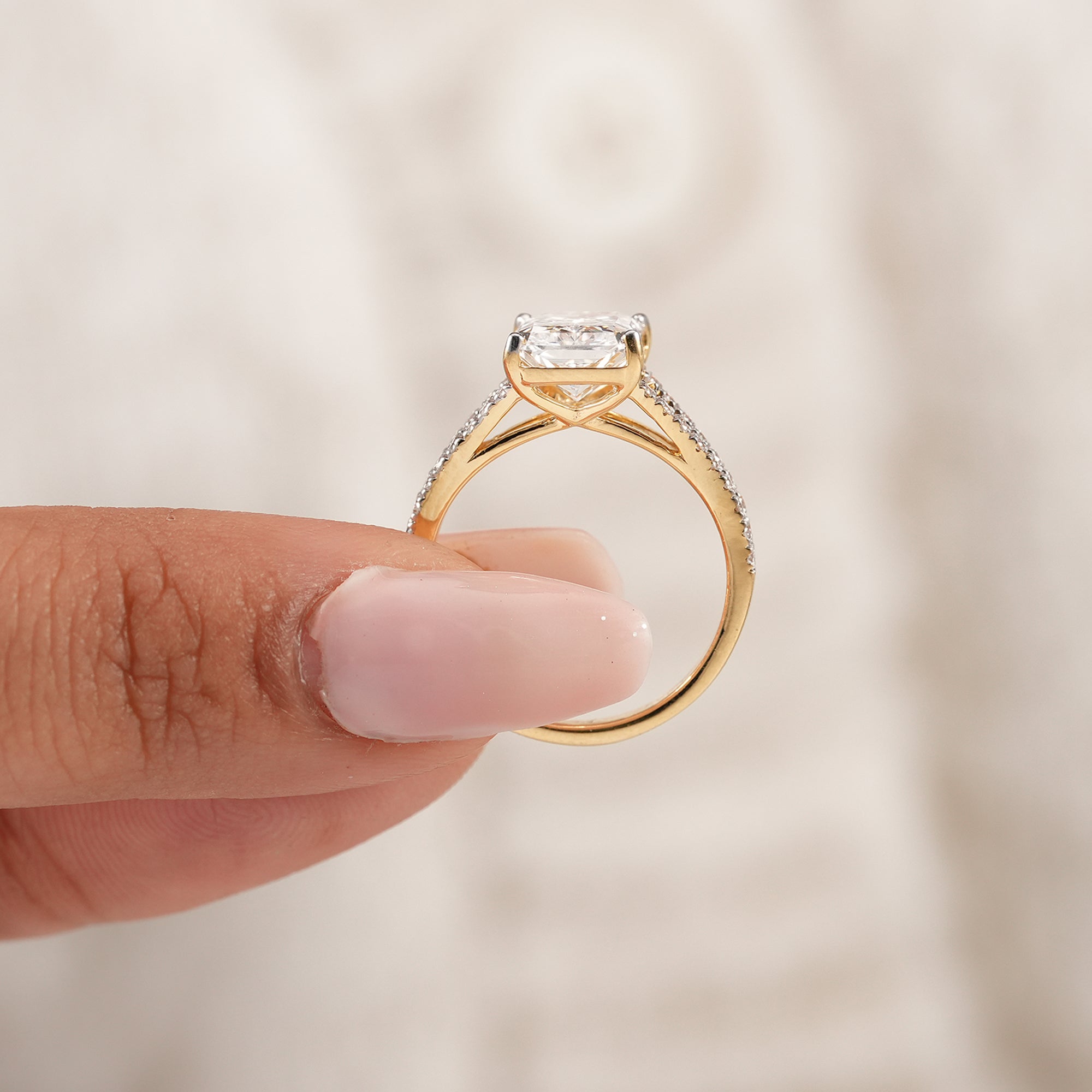 Modern radiant engagement ring with double pavé band