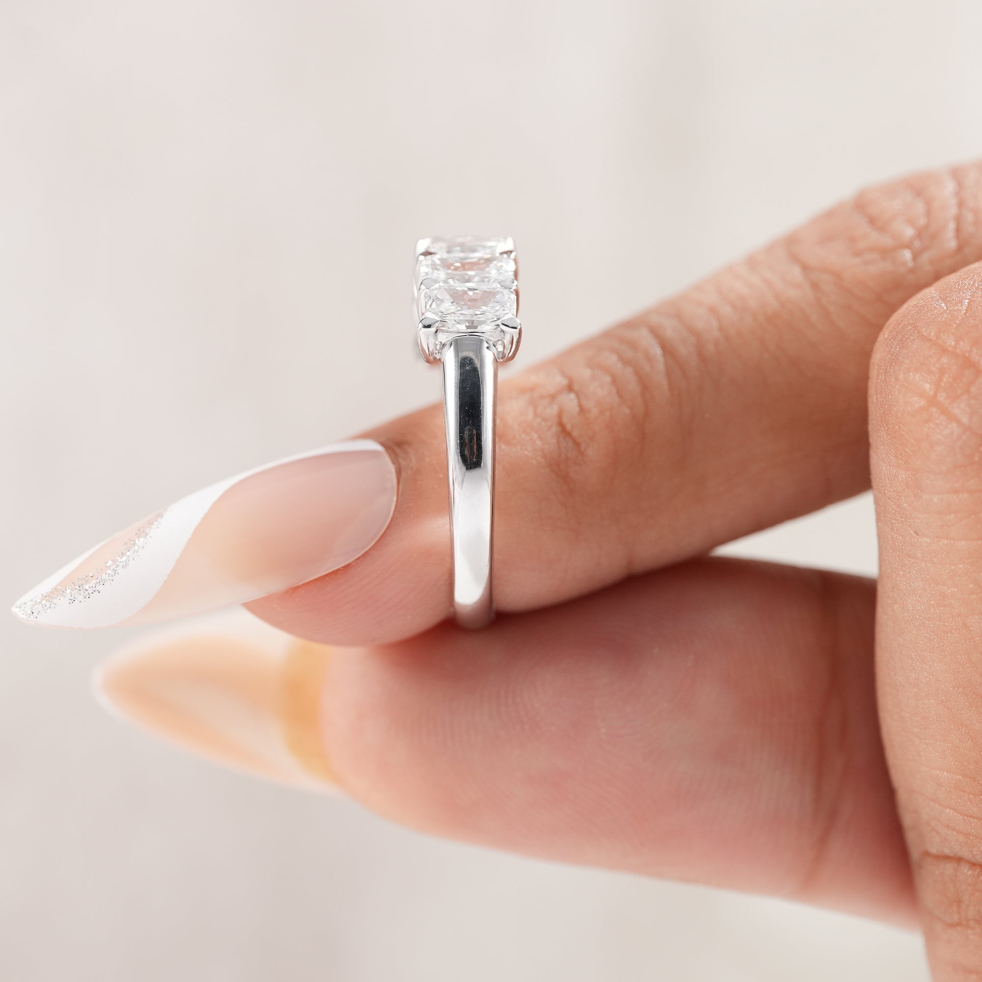 Handmade seven stone radiant lab diamond ring.